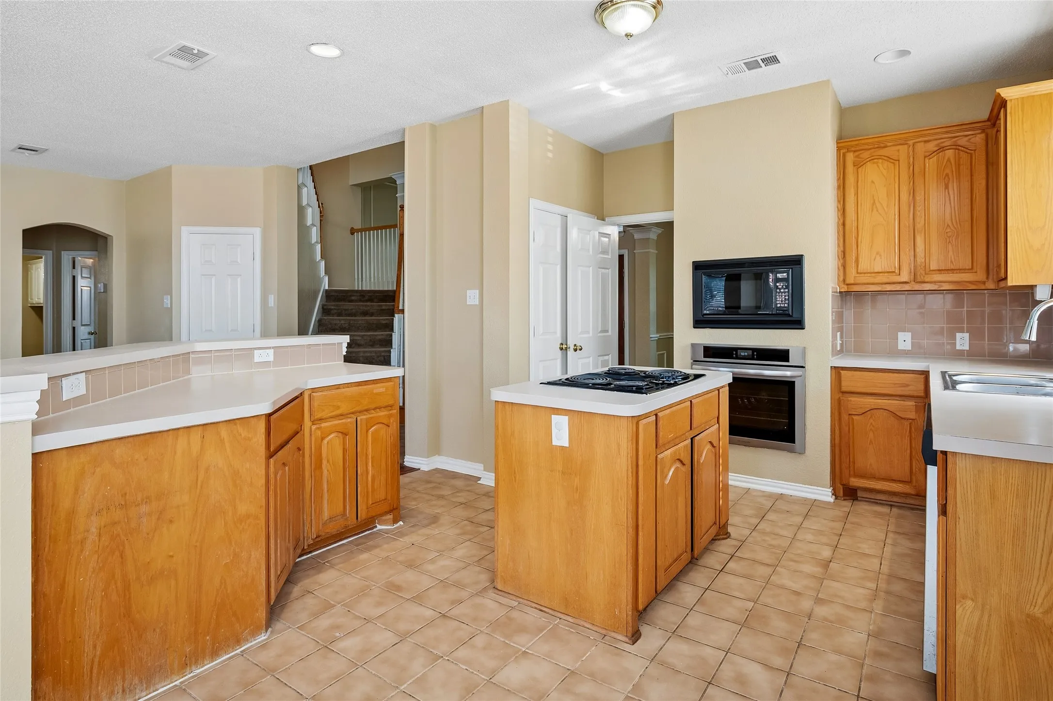 Kitchen has good size pantry and lots of cabinets for storage