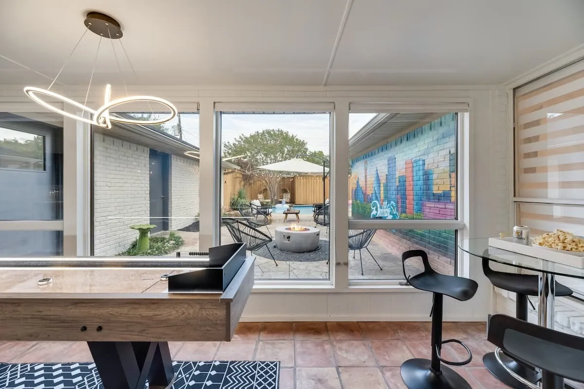 Sunroom overlooking the gorgeous backyard!