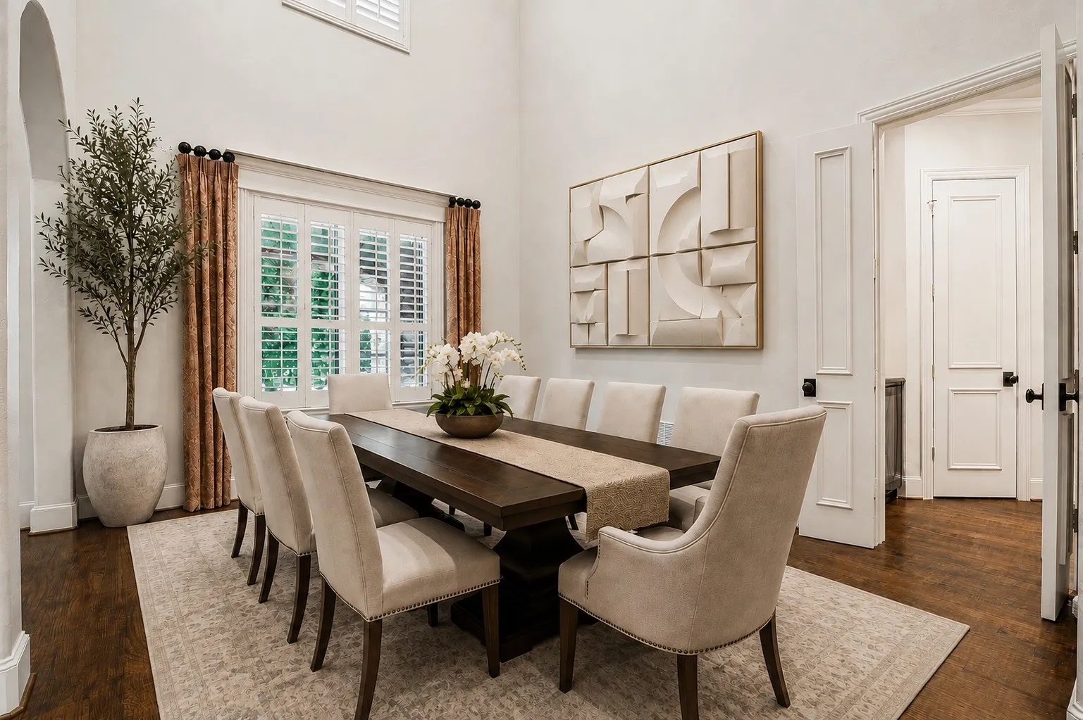Hardwood flooring, tall ceilings, white plantation shutters. virtual staging