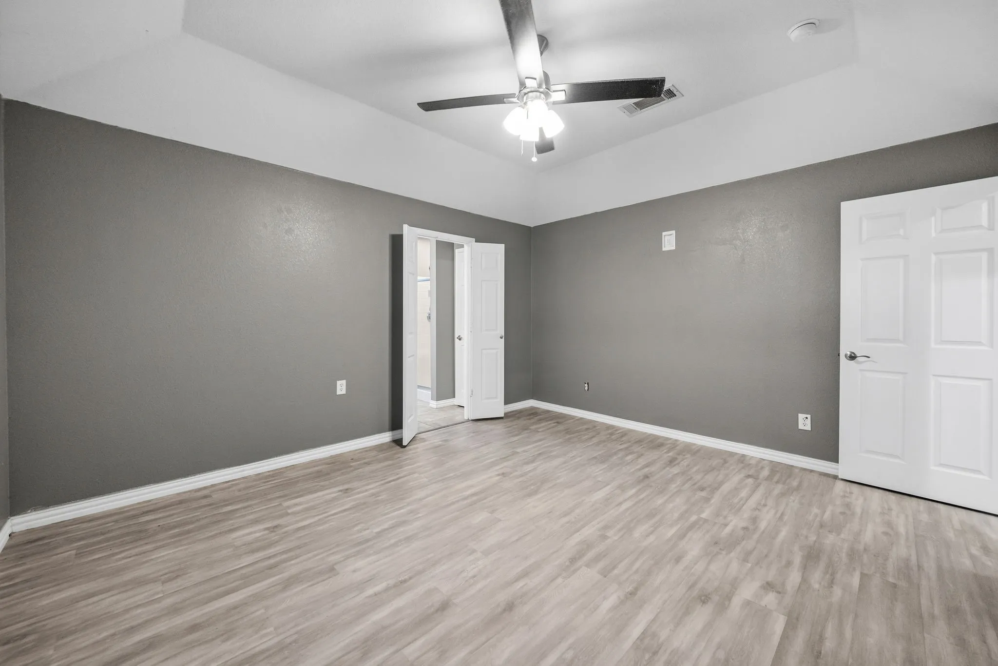 Wood-finish flooring with neutral wall tones