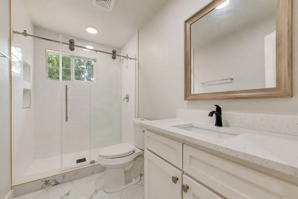 Vanity with composite stone countertop and integrated sink