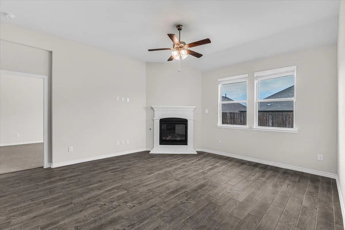 Huge family room with  romantic fireplace