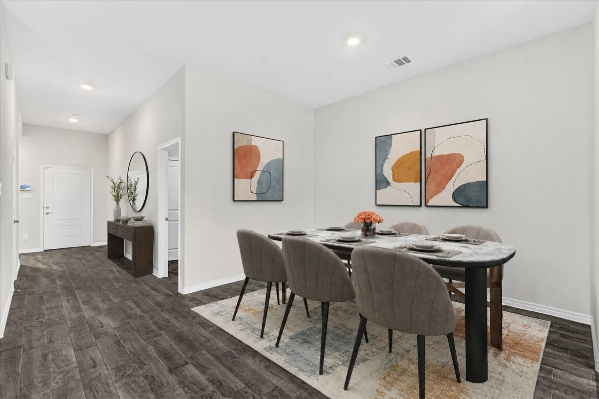 View from Family Room Looking Into Dining Area Virtually staged to show potential