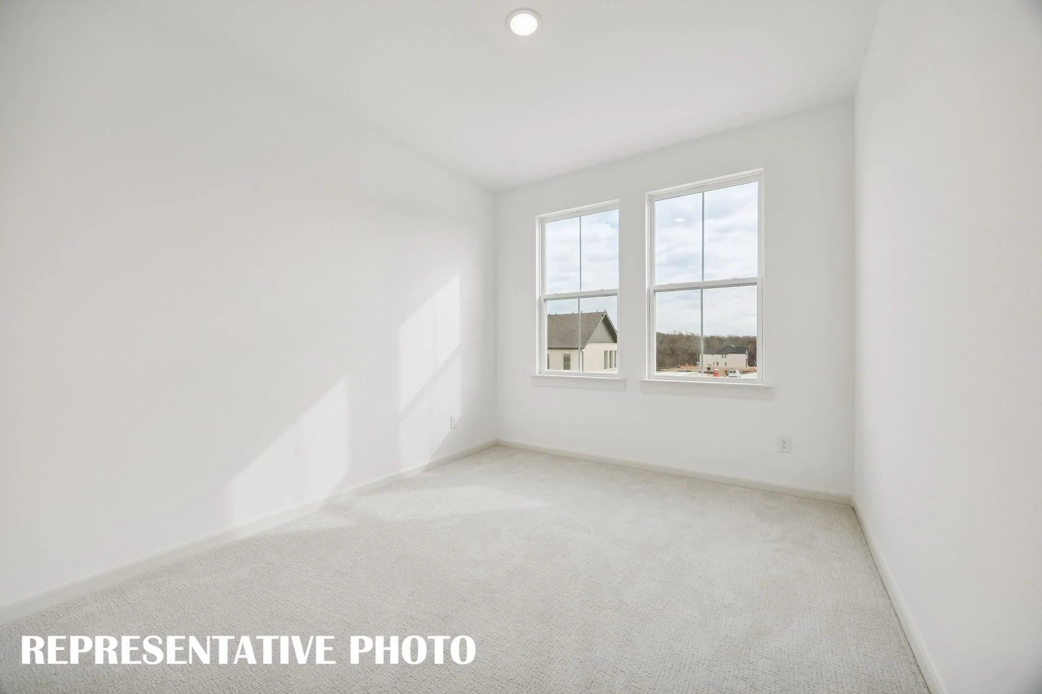 You'll find nicely sized secondary bedrooms in our Emmeline plan.  REPRESENTATIVE PHOTO