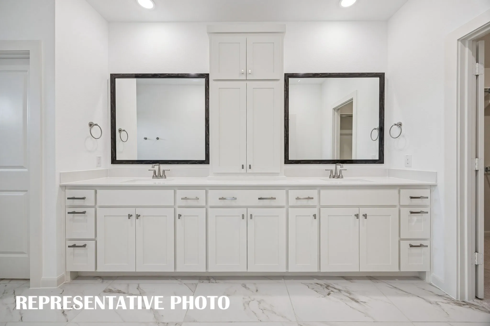 There is ample space for two in this lovely owner's bath!  REPRESENTATIVE PHOTO