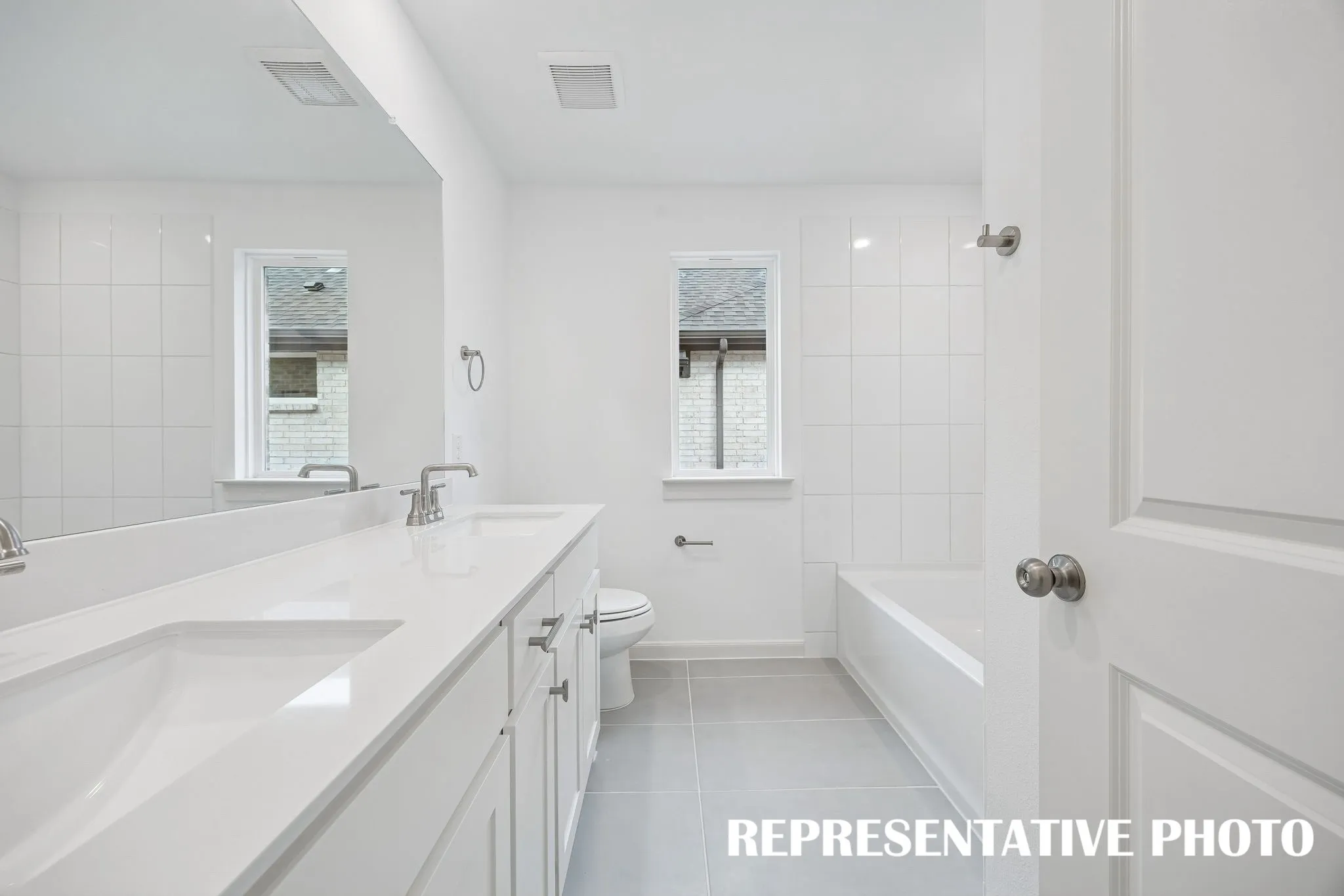 Guests will feel right at home in this beautifully finished guest bath!    REPRESENTATIVE PHOTO