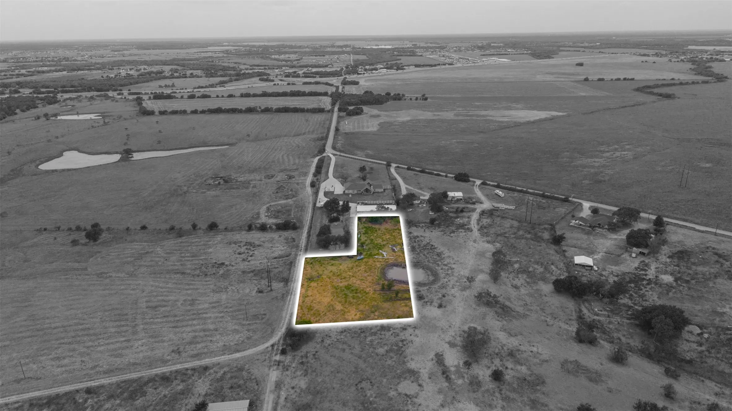 Expansive lot with a natural pond and established perimeter