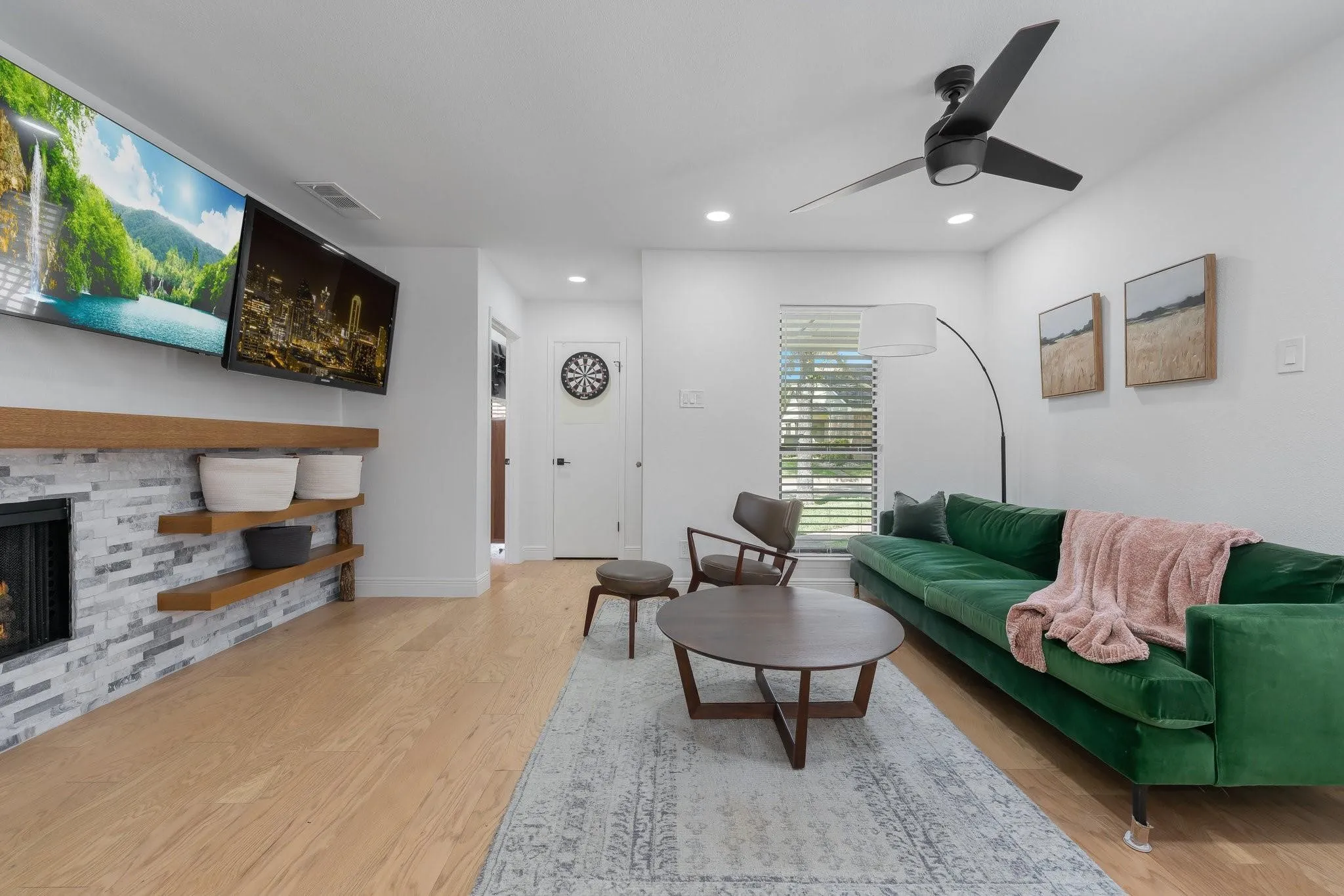 Light wood-finish flooring, recessed lighting, and a modern ceiling fan