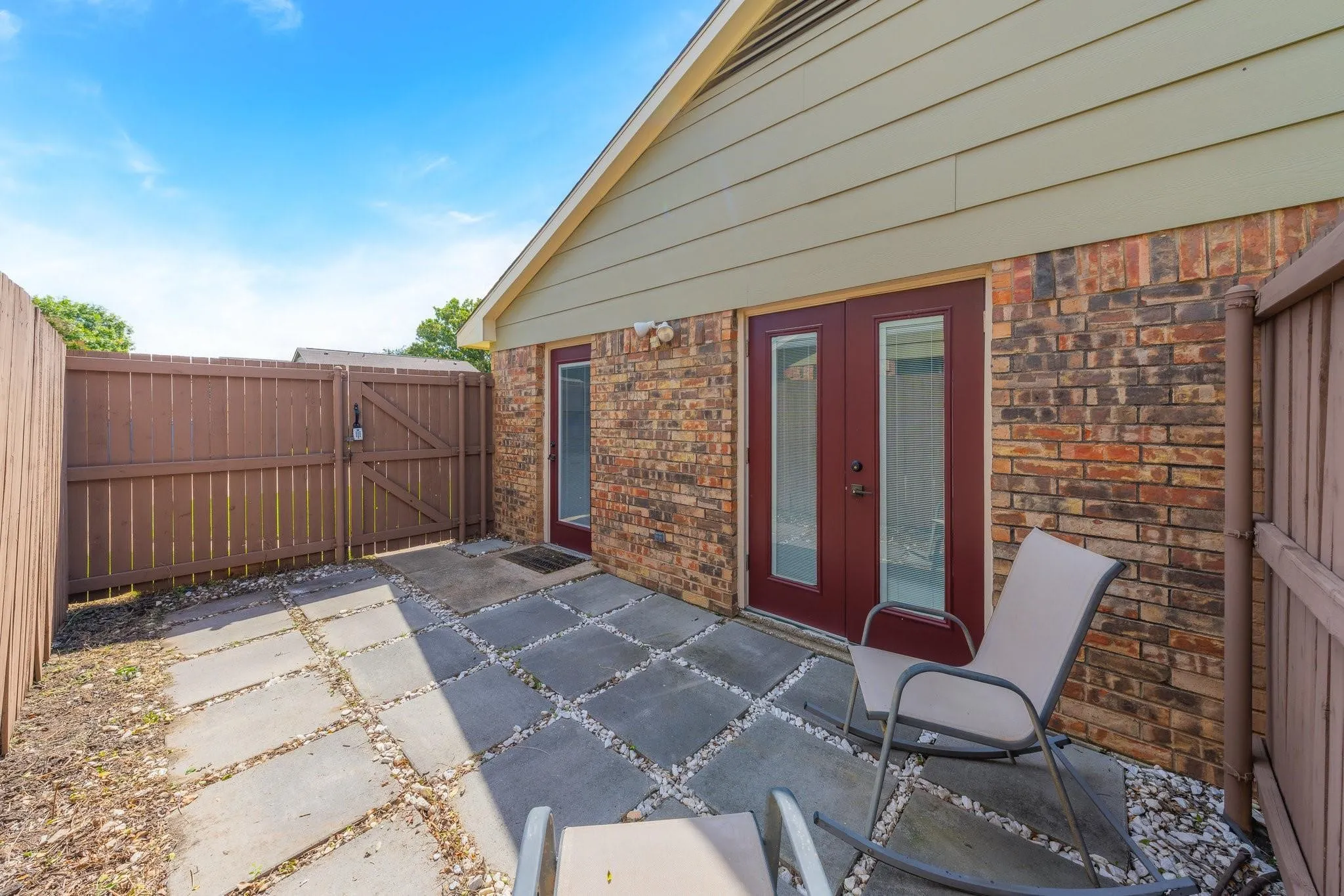 Brick exterior with horizontal siding accent