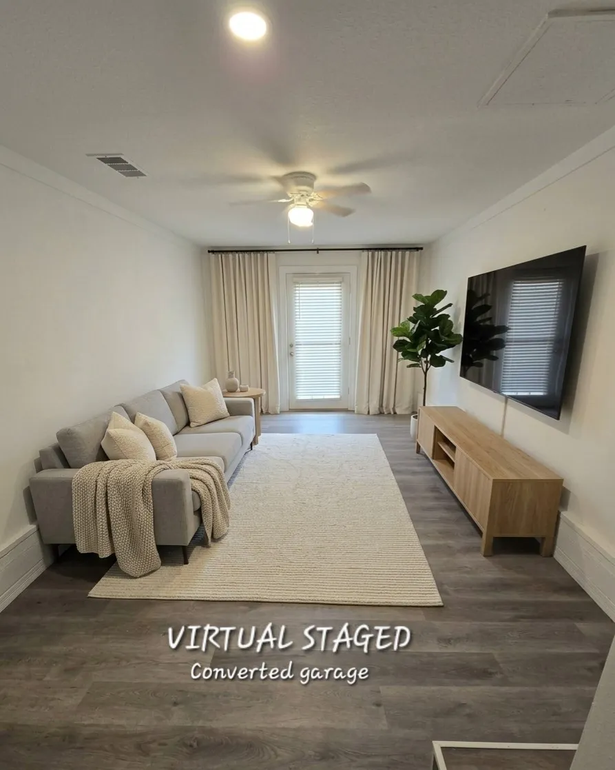 Virtual staged converted garage as extra living space.
