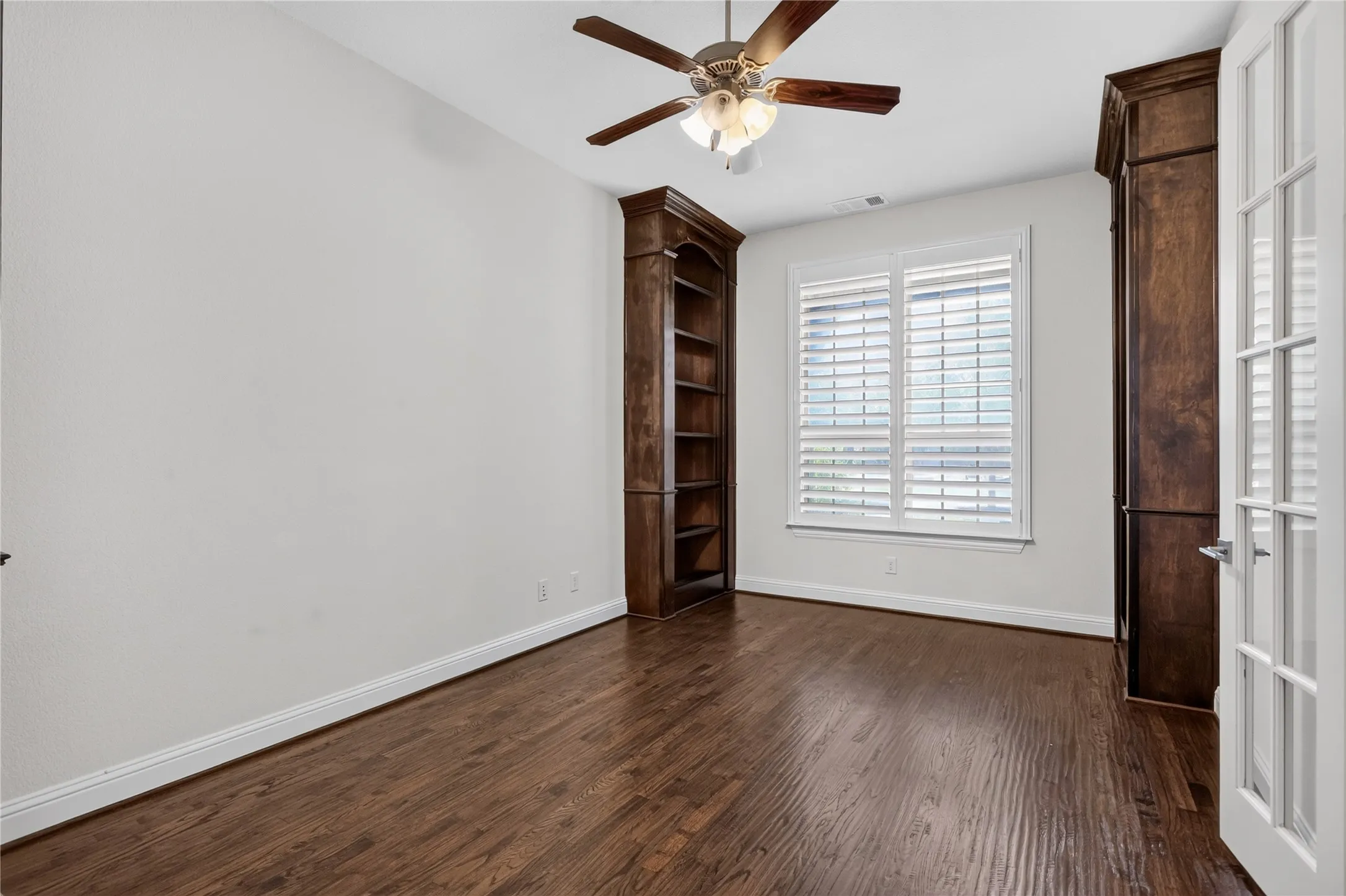 Front study / library with built in shelves.