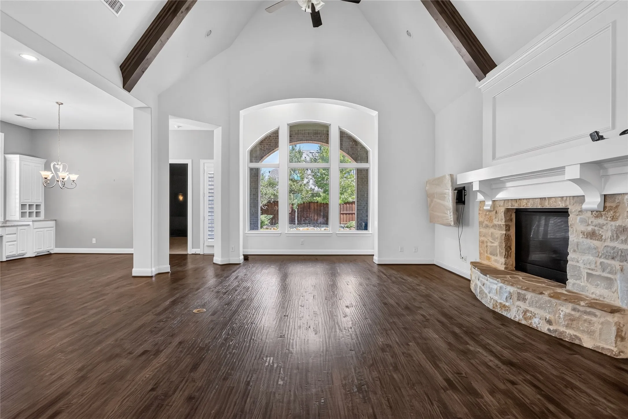 Huge living room view from from the starirs/foyer.