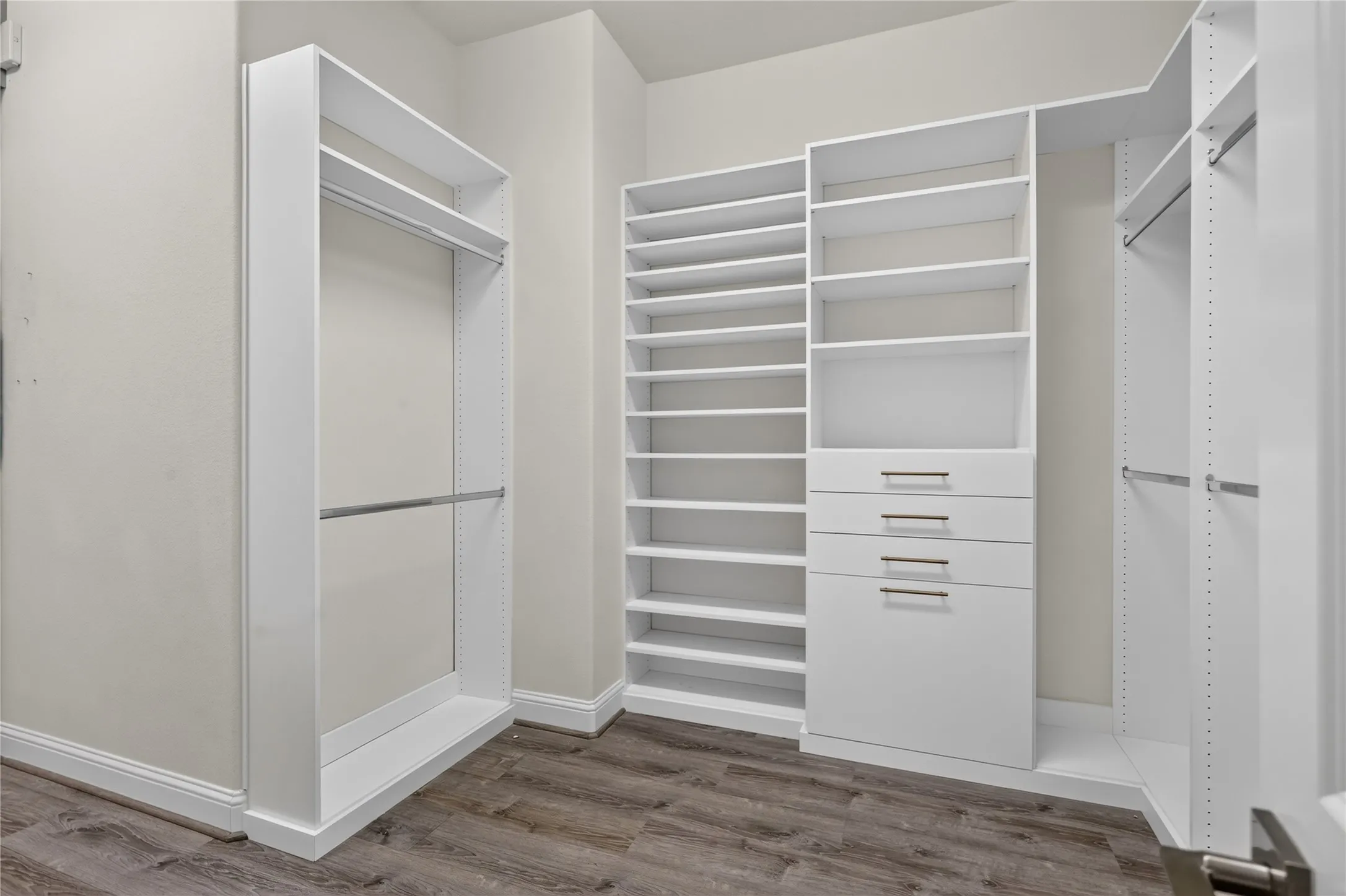 Primary closet, view from the bathroom.