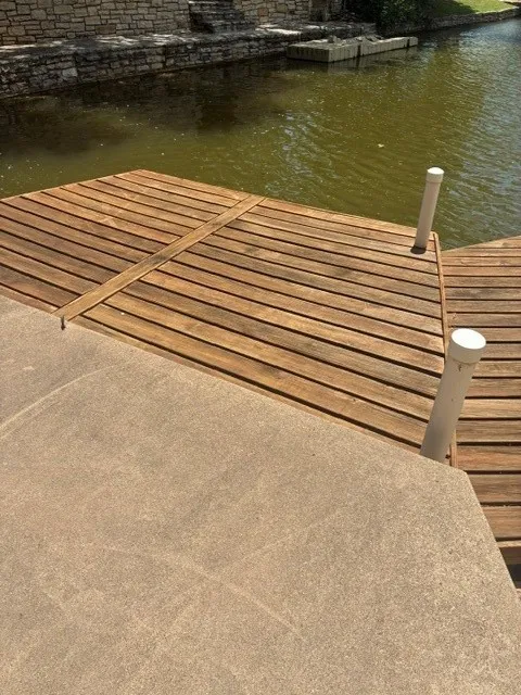 SMALL DOCK, CEMENT PATIO AT WATER FRONTAGE