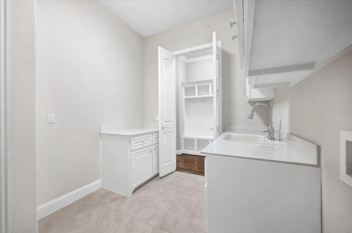 Large Laundry room with lots of storage & room for 2nd fridge/freezer