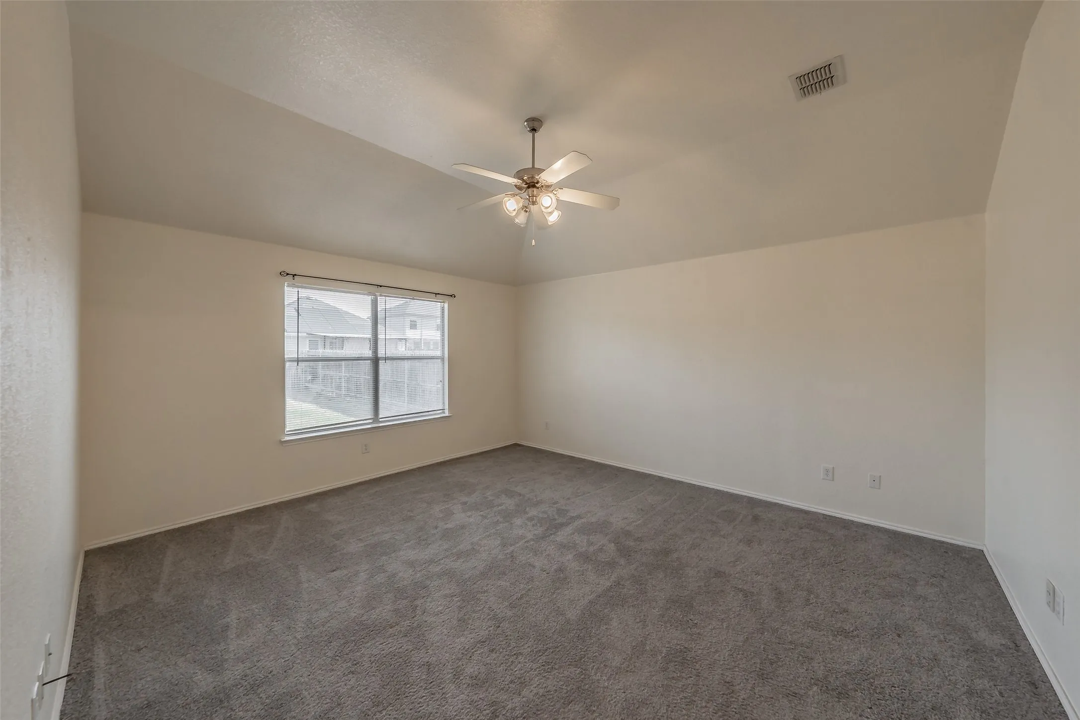 The master bedroom is separate from the other two bedrooms.