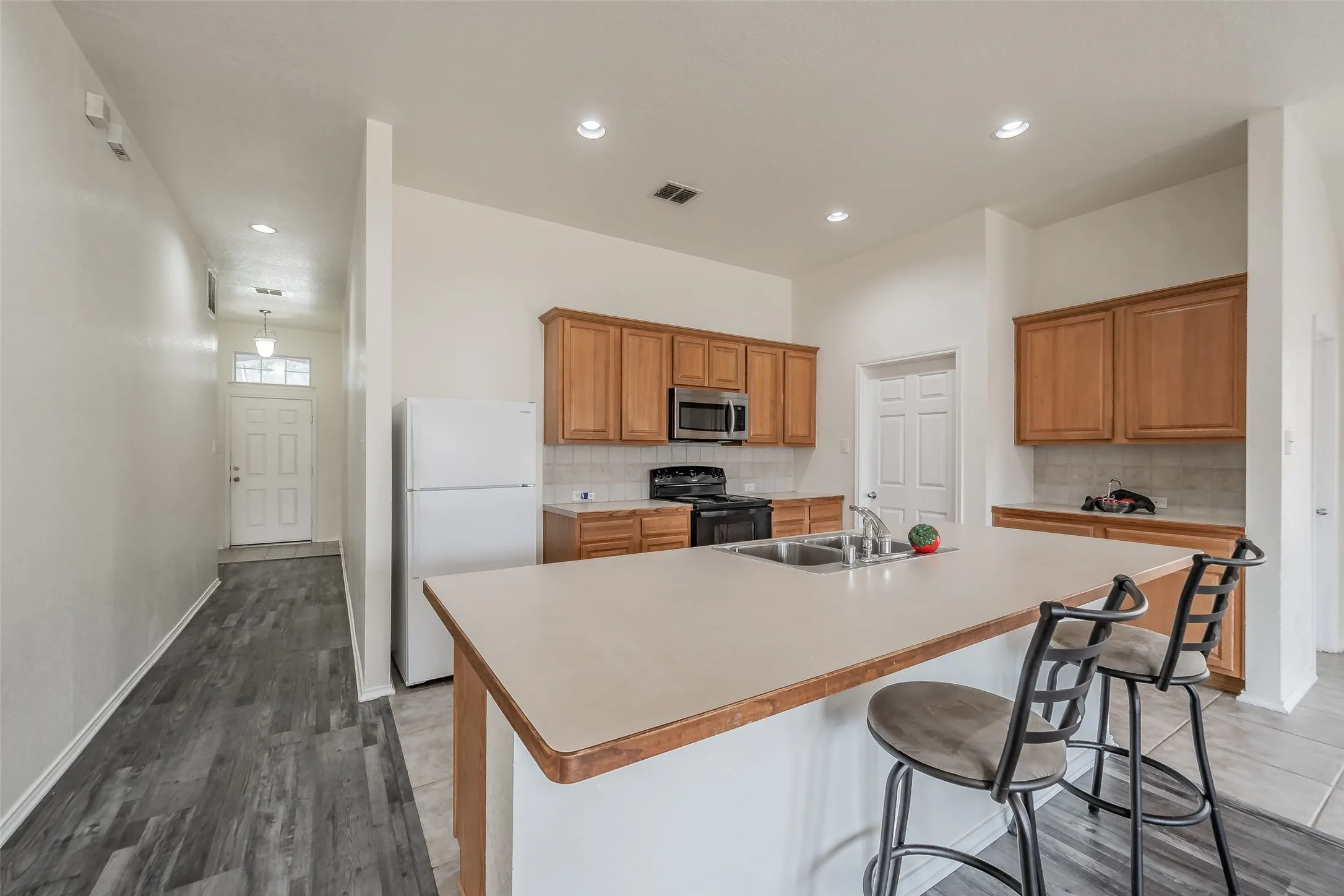 Open concept kitchen with all necessary appliances