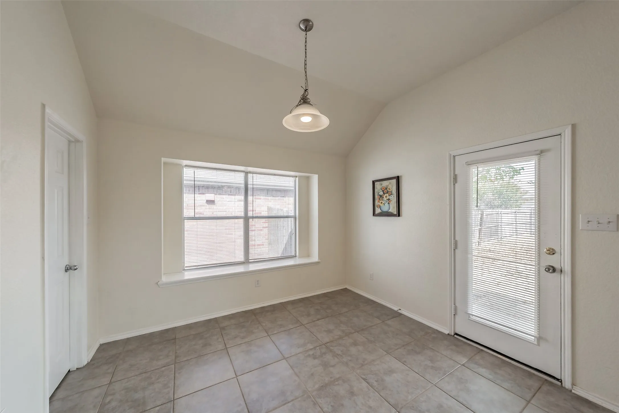 Ceramic tile flooring in the dining area.