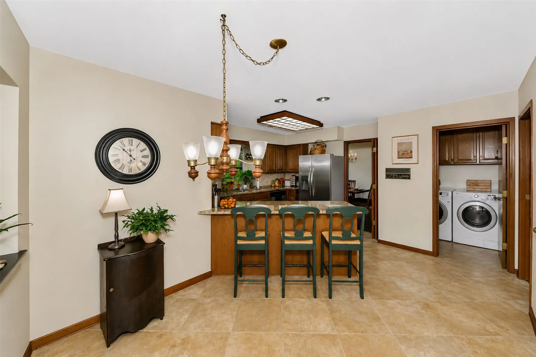 Breakfast area looking toward kitchen breakfast bar.