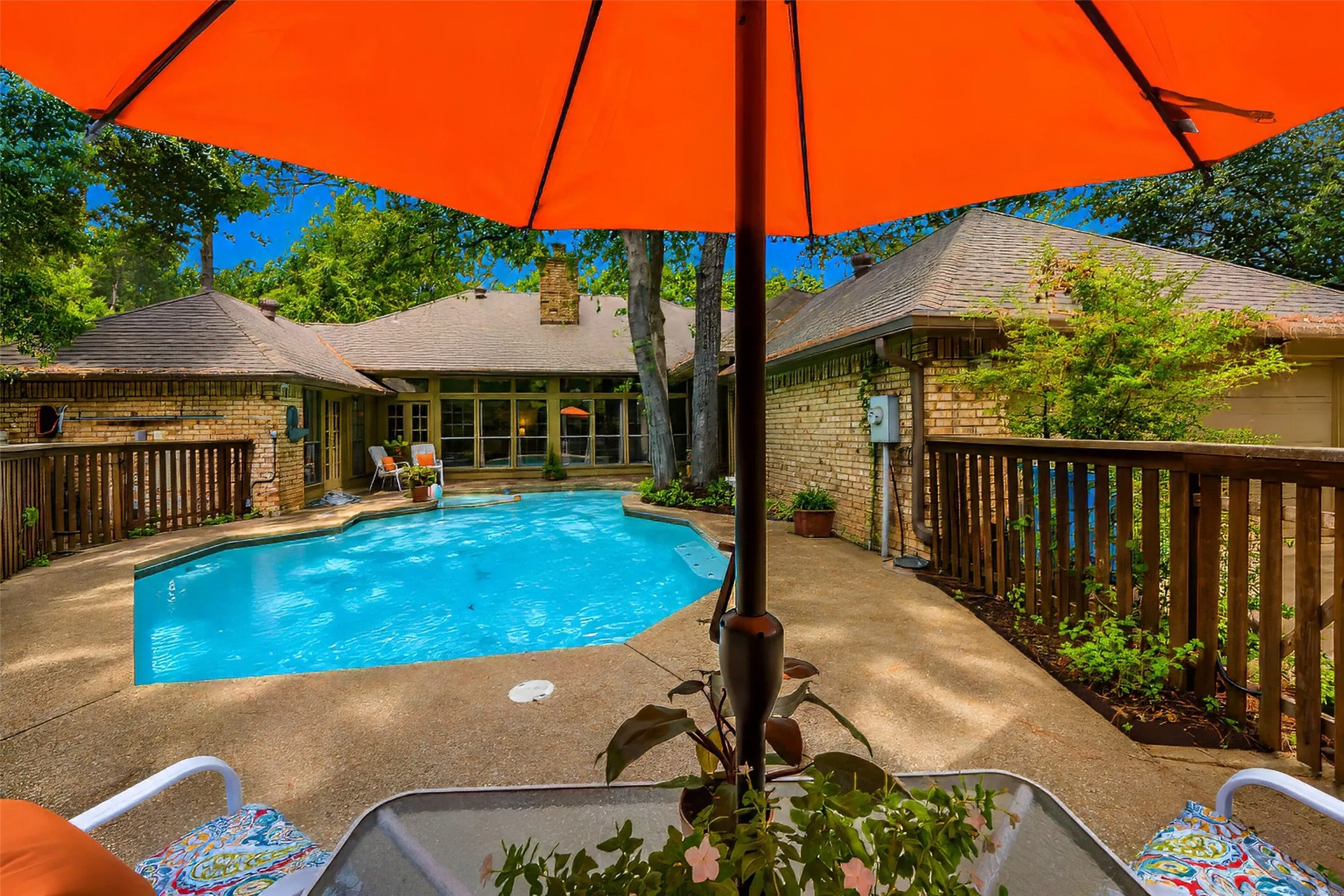 Enjoy sun and shade around the gorgeous pool.