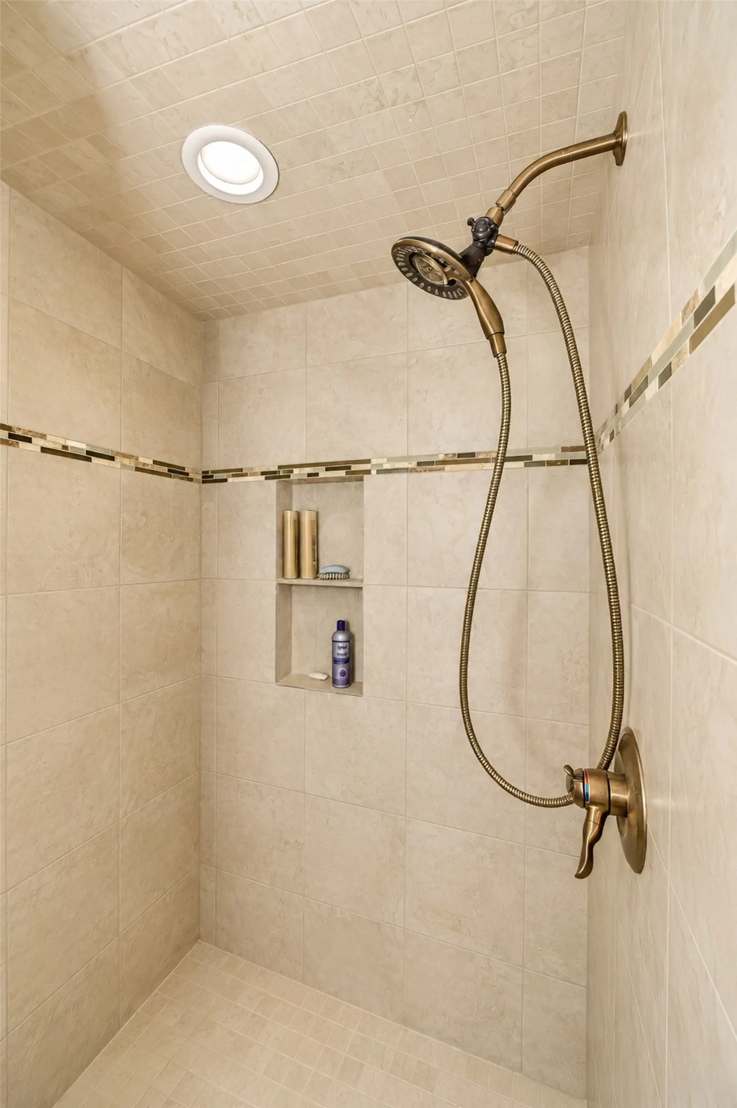 The primary bathroom features an updated separate shower.