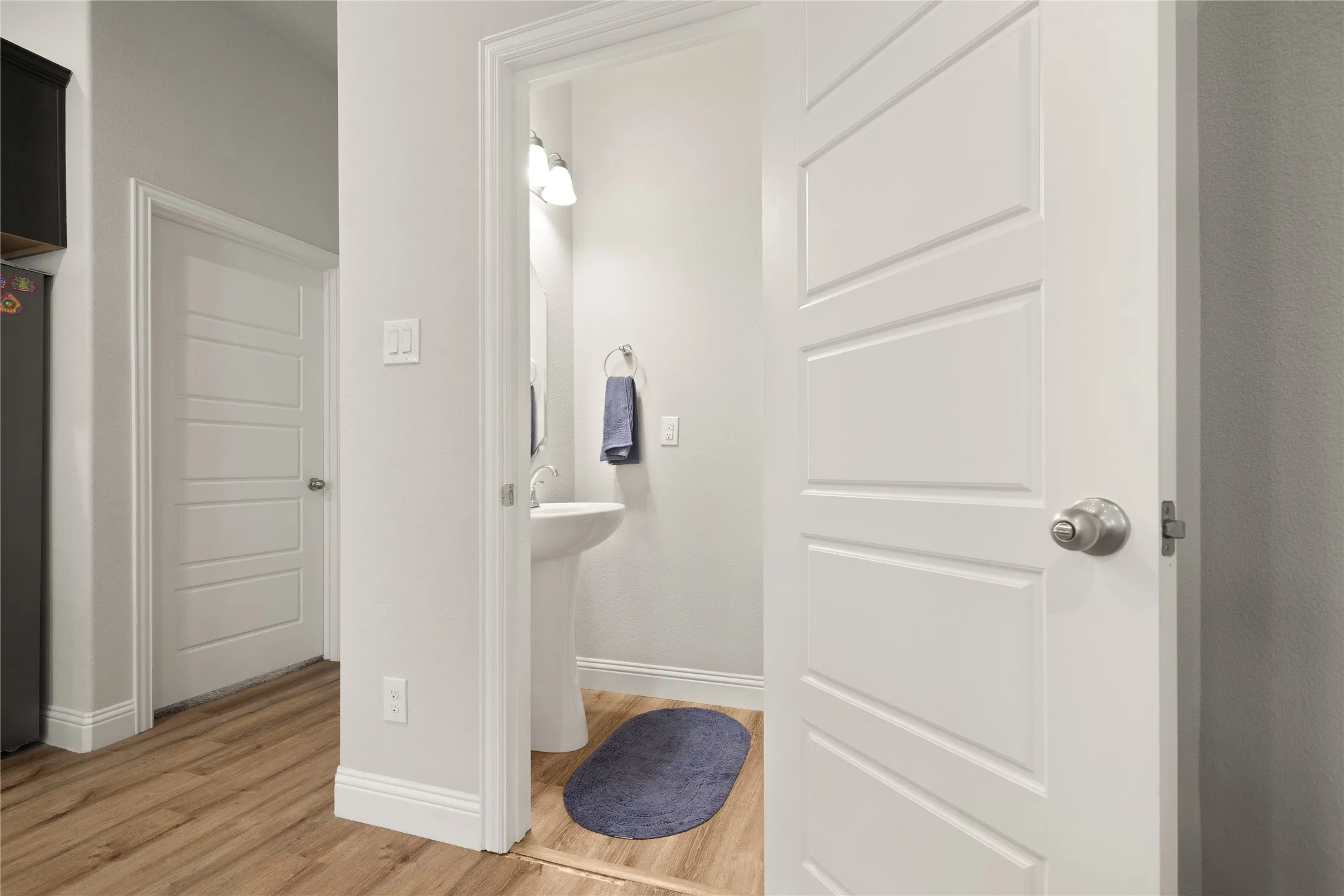 Half bath upstairs off the living for convenience and guests.