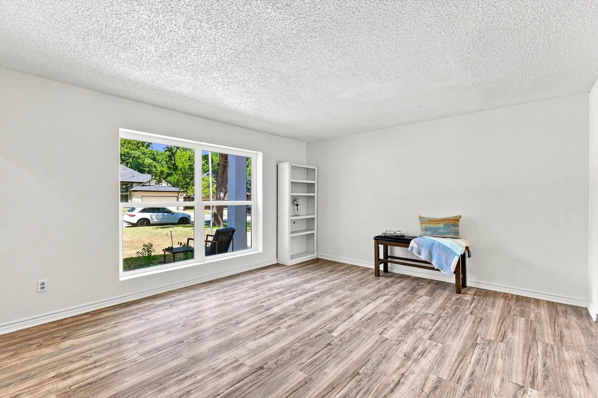 Another view of Front Living Room with New Windows Throughout