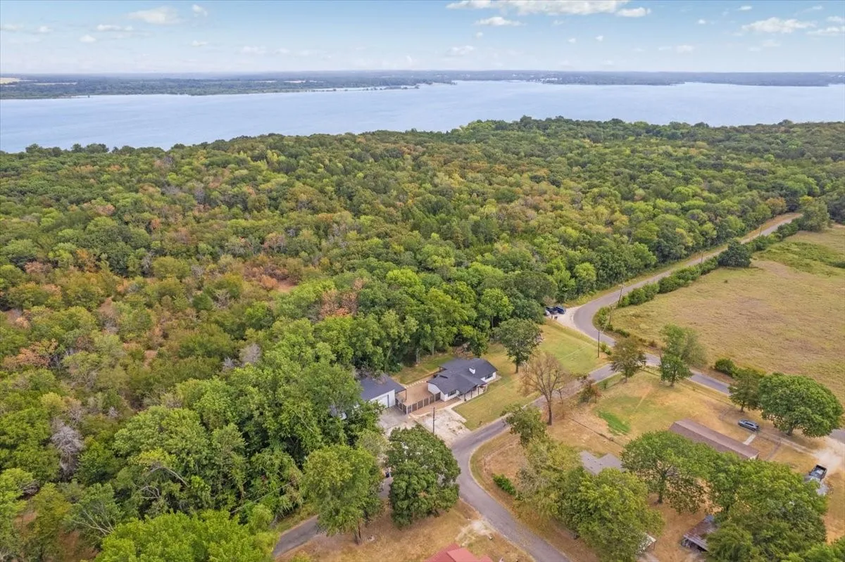 Extensive forested land with Lake Texoma in the background