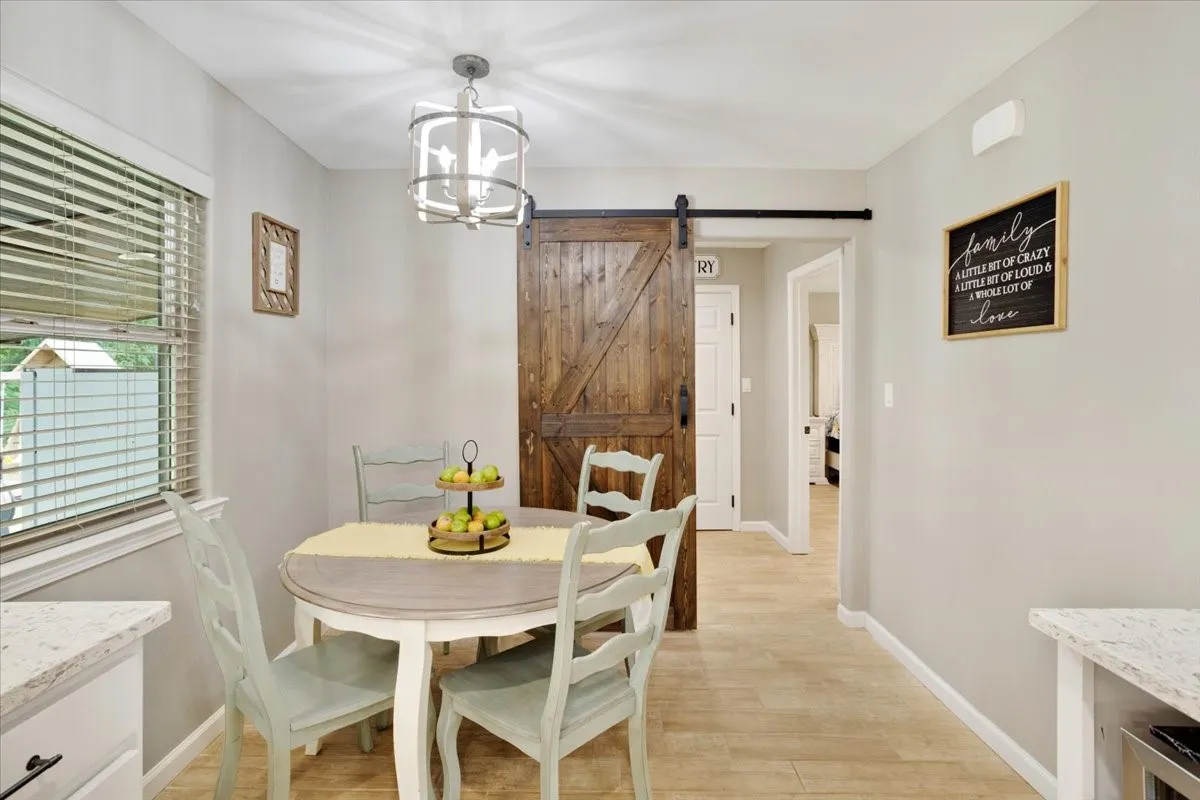Wood-finish flooring with light-toned walls