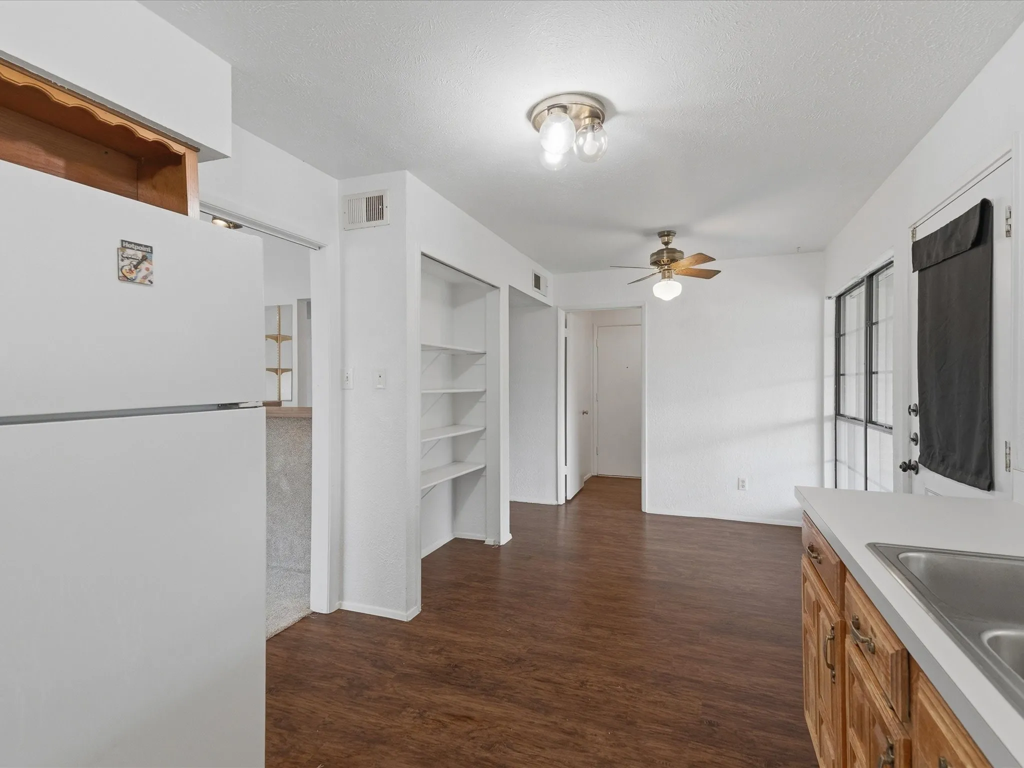 Wood-finish flooring throughout the main area