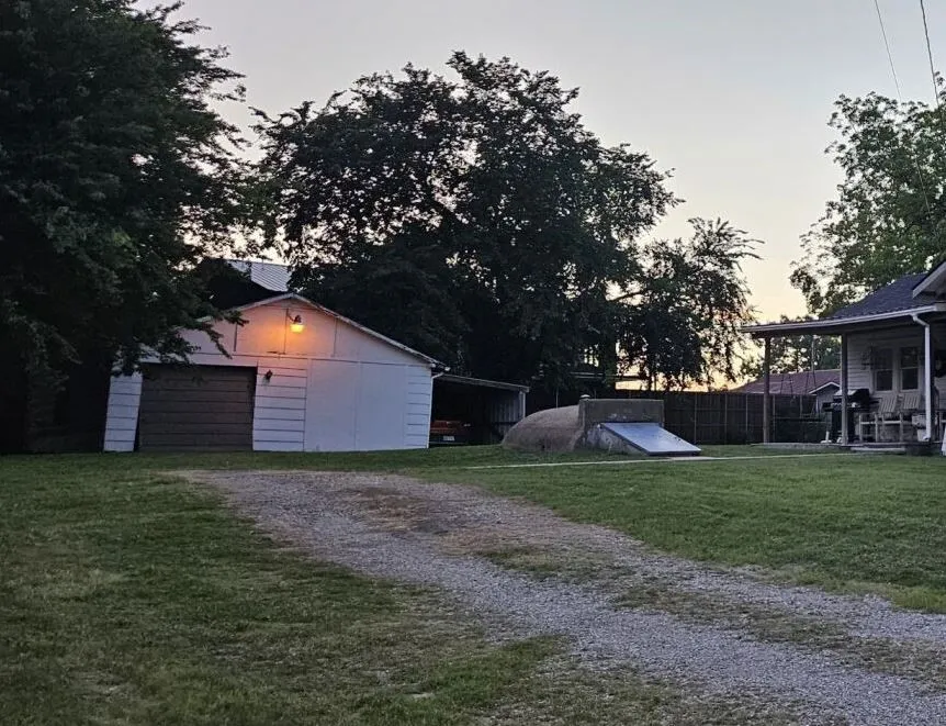 Property has  a home and this garage. Home is not insurable in current state.