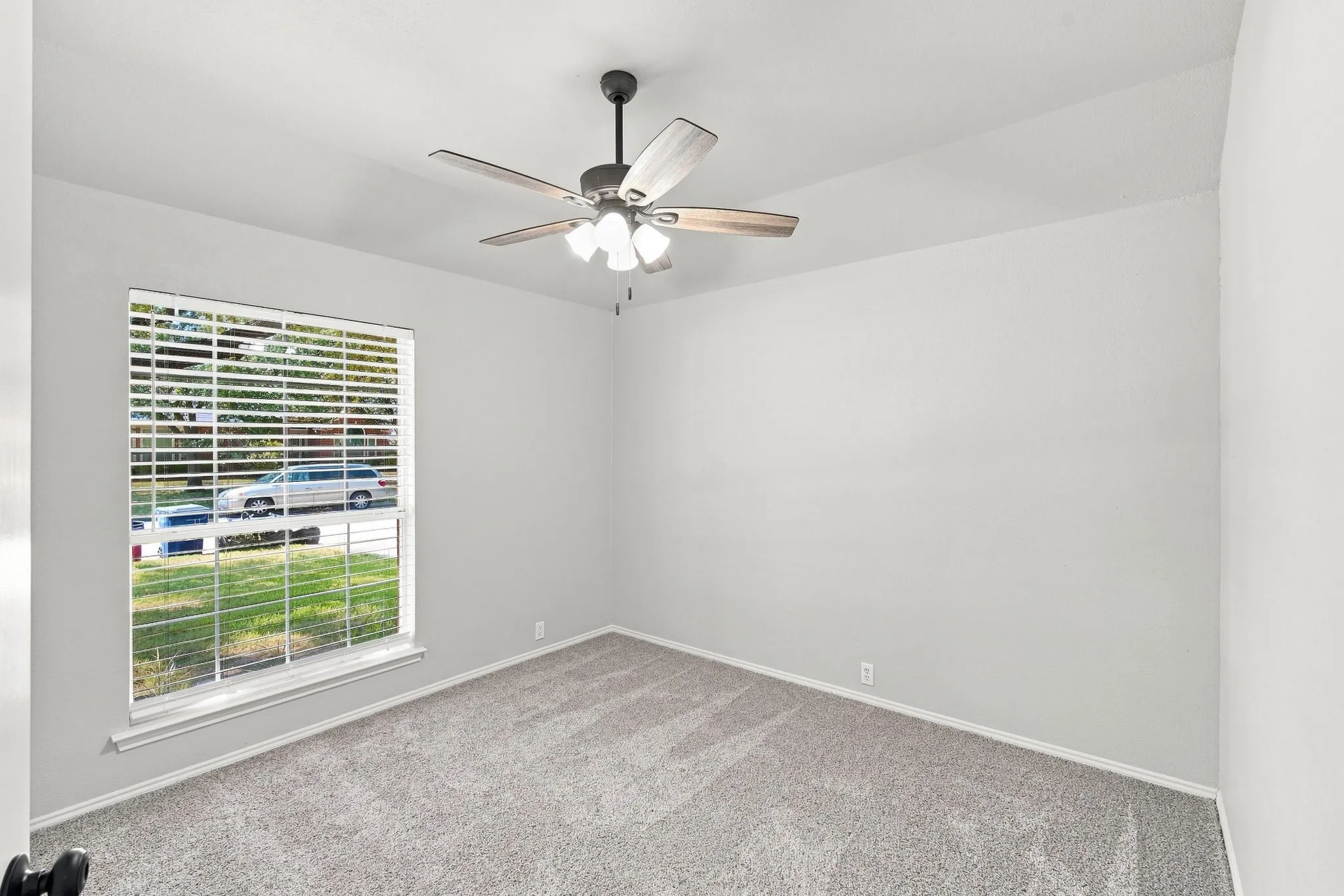 Third bedroom with fresh carpet and large closet.