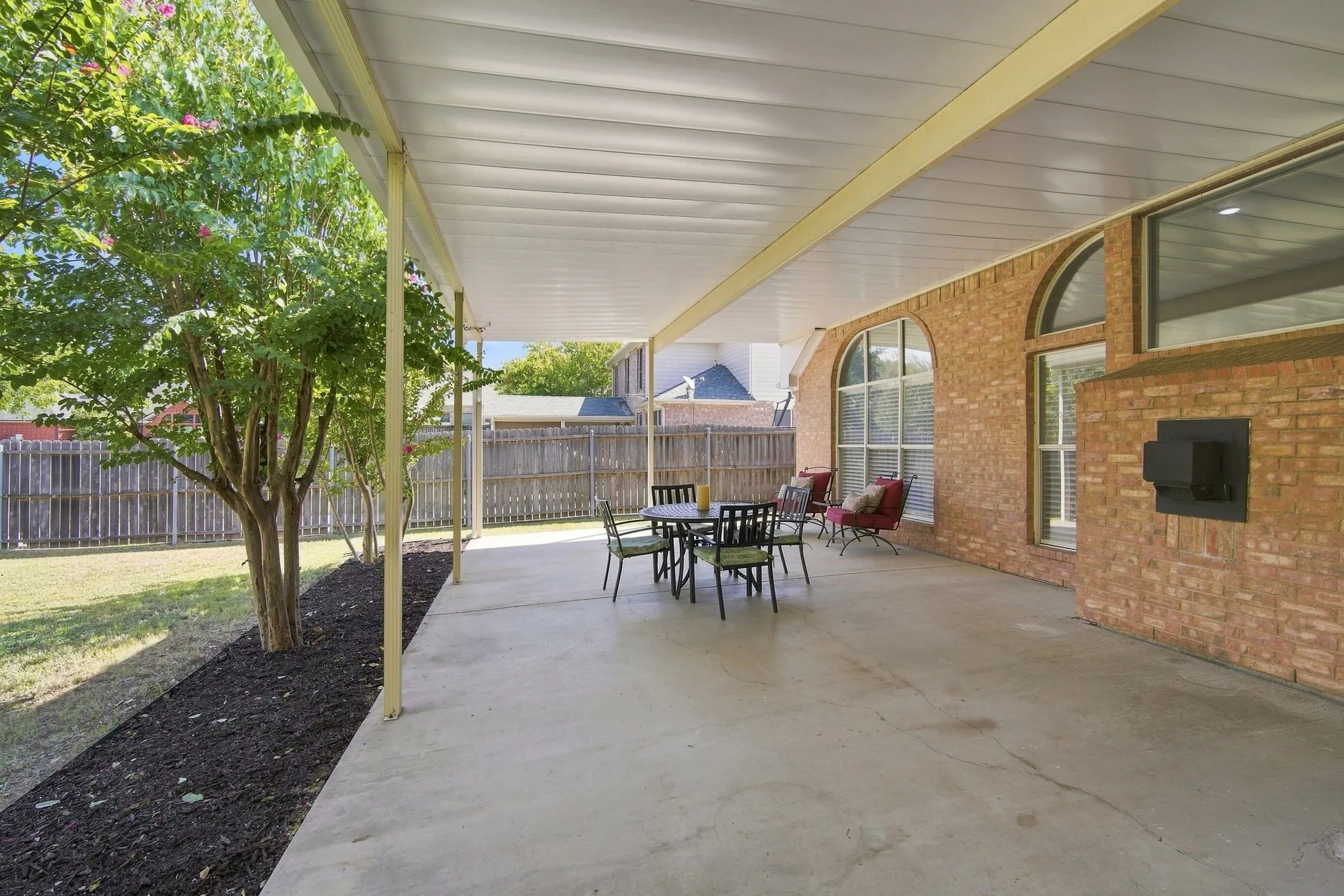 HUGE PATIO that runs across the home.  Nicely covered and ready for entertaining.