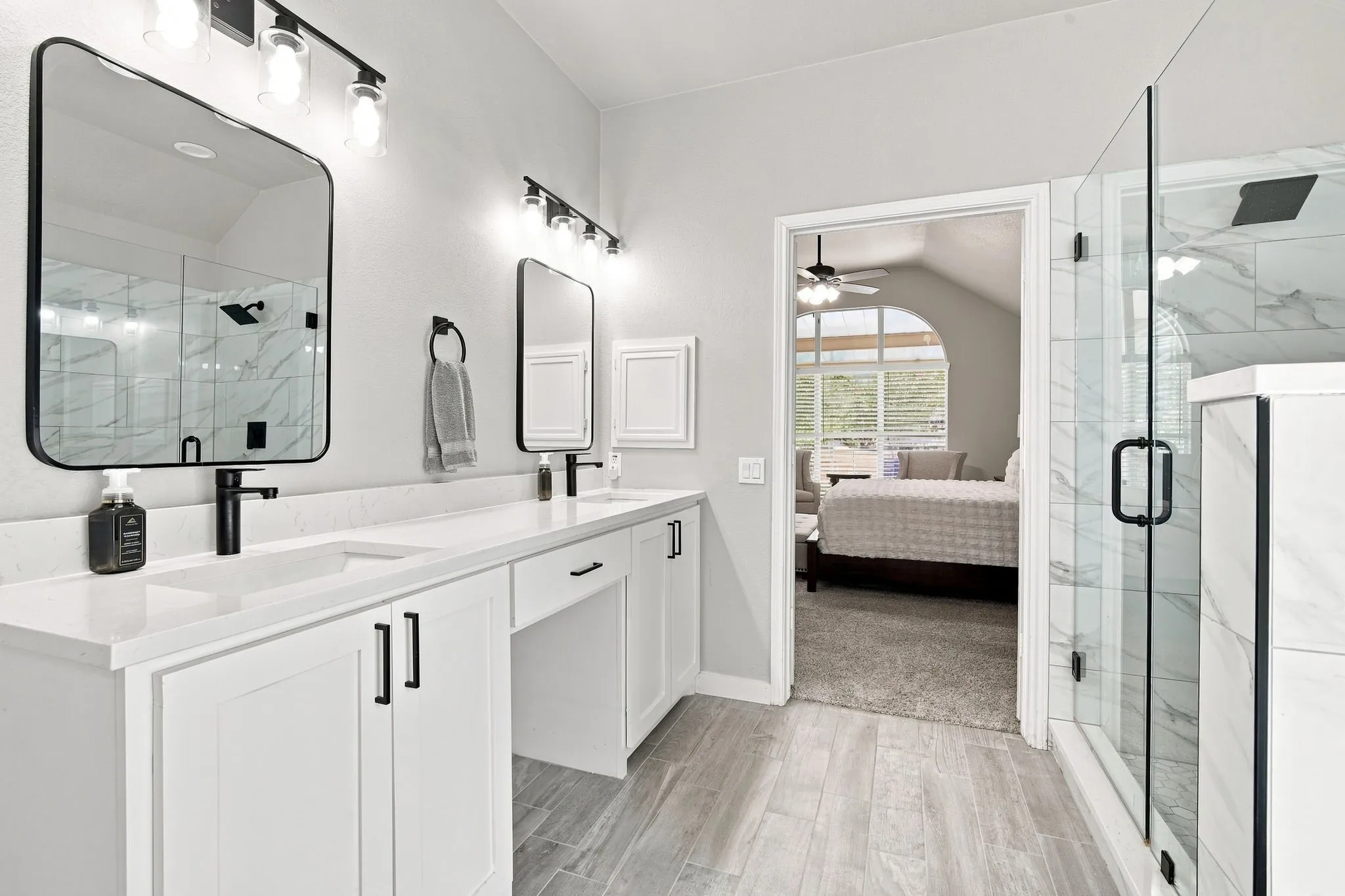 Nicely updated with extended vanity cabinets and double sinks.