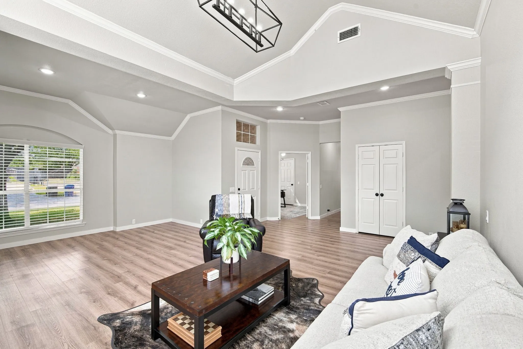 Natural light accents this lovely home with large windows and newer window blinds.
