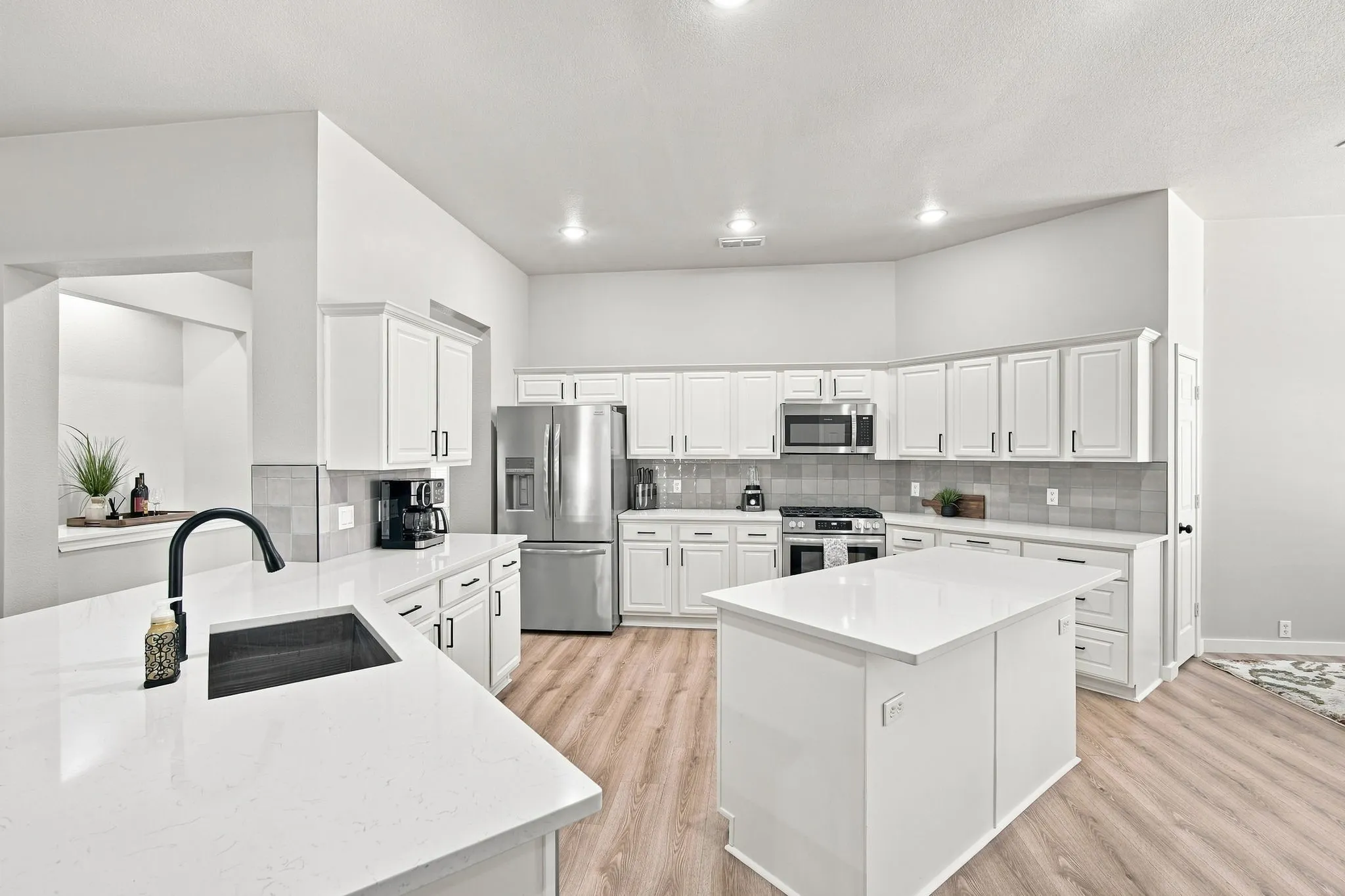 Check out this fabulous kitchen.  Light and bright with designer features.