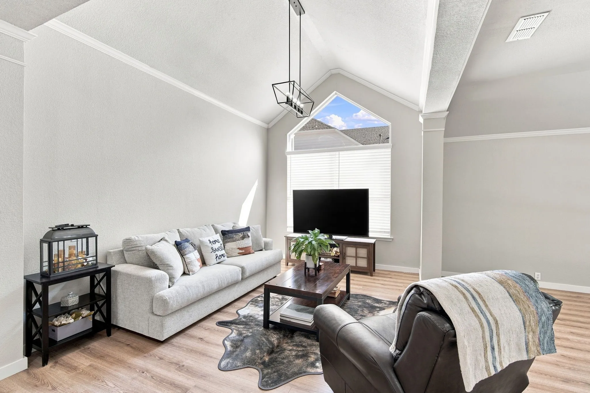 This formal space can be used as dining room, living space, TV watching, recreation space, etc.  Luxury designer flooring provides low maintenance and durability.