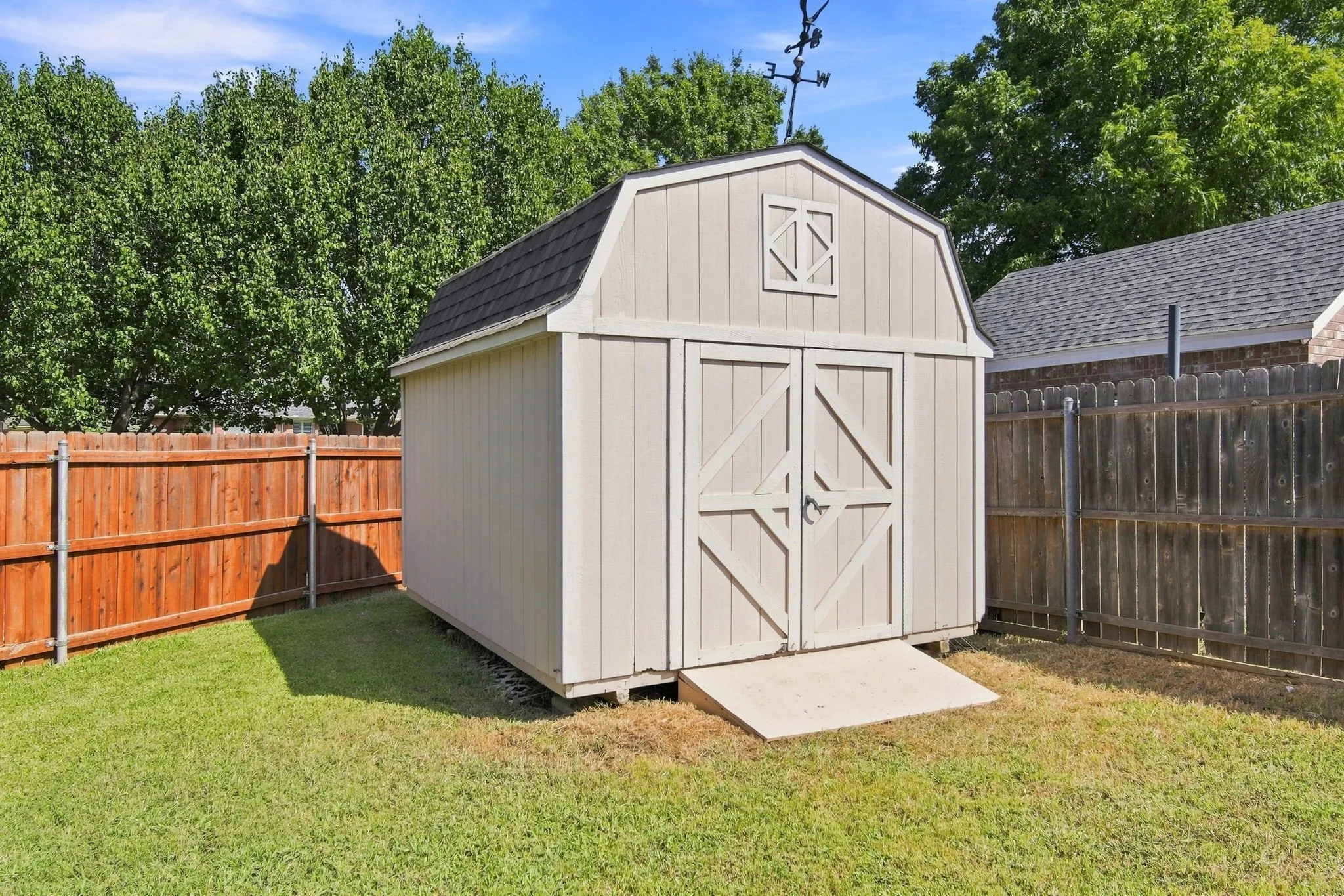 12 x 10 backyard shed.  10 ft tall for all storage needs.  Convenient ramp for wheeling items in and out.