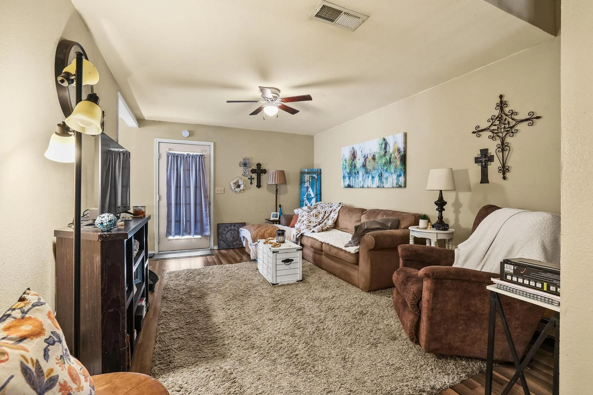 Enter into living room with laundry and garage to your right.