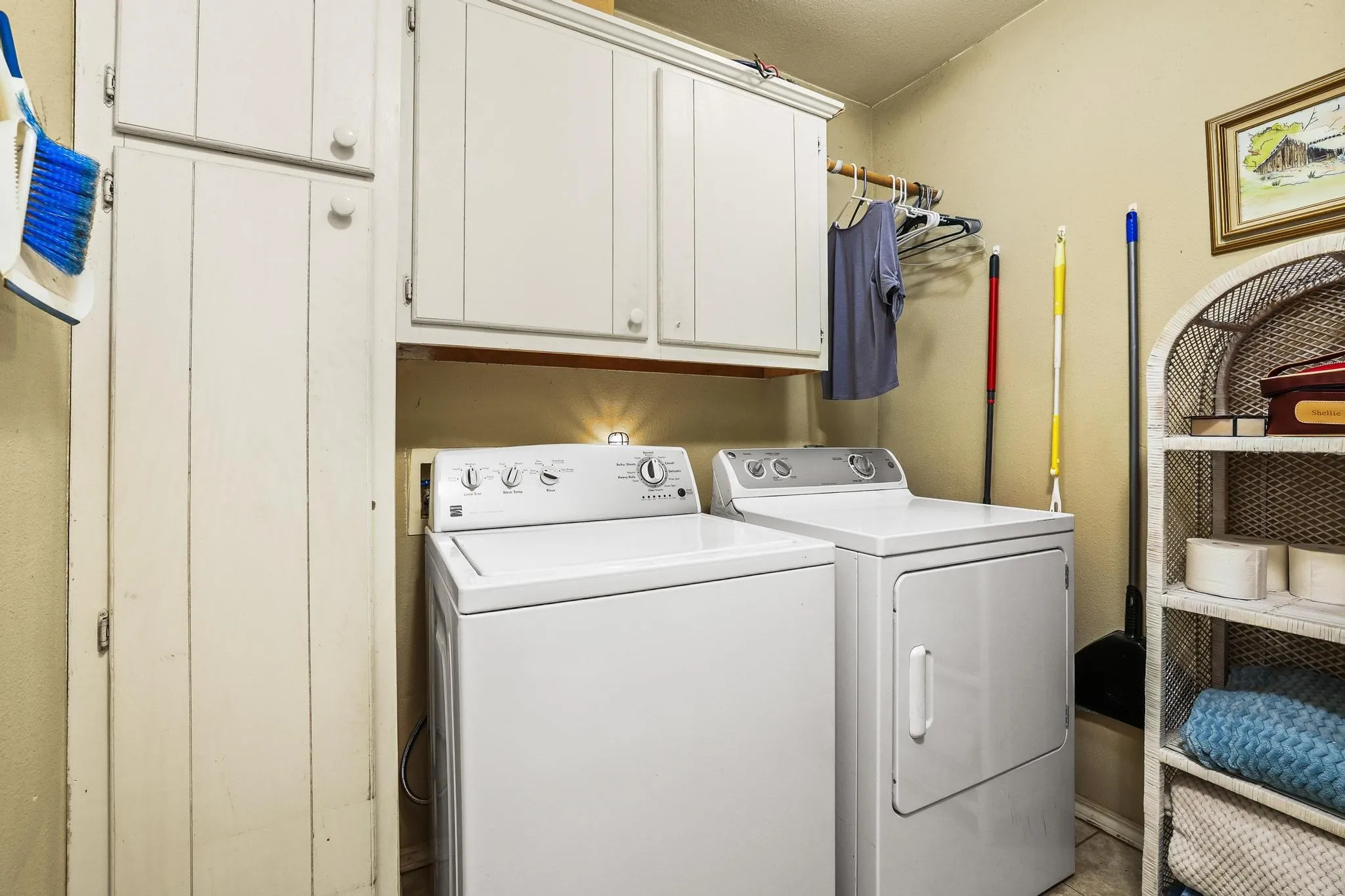 Laundry room in downstairs full
bathroom.