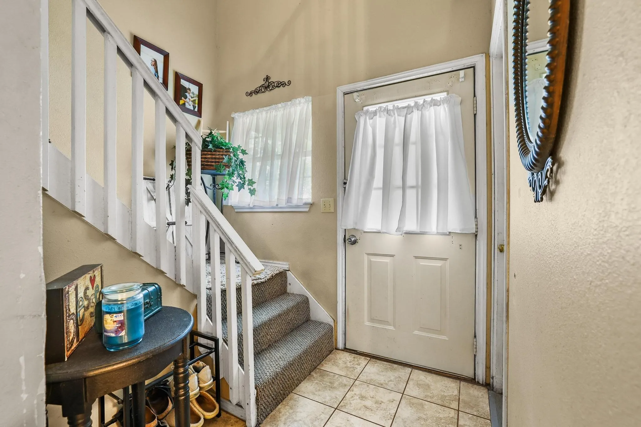Entry and stairs by the front door.