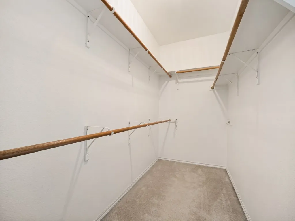 One of 2 walk in closets in Primary bedroom