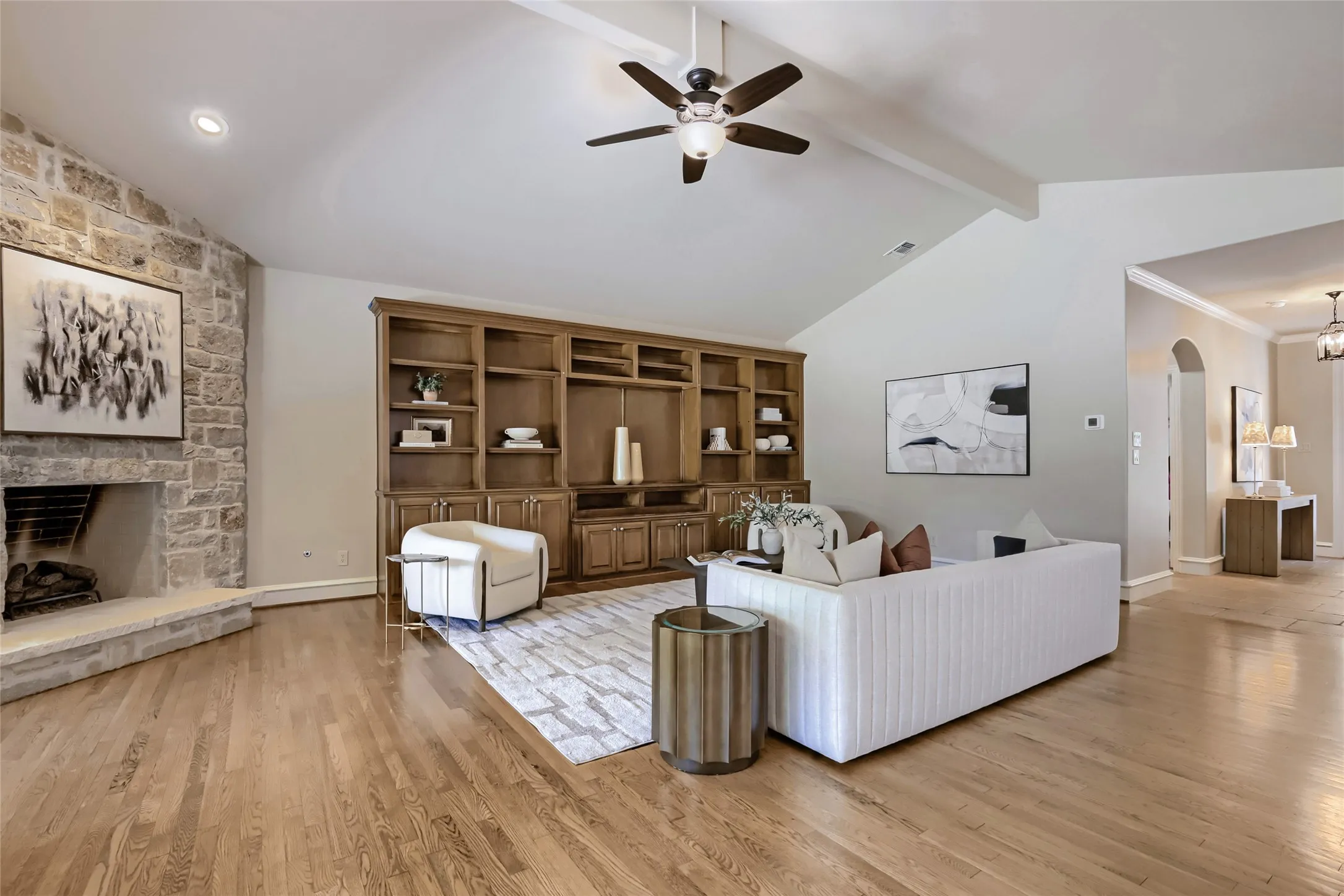 Hand scraped wood floors throughout.