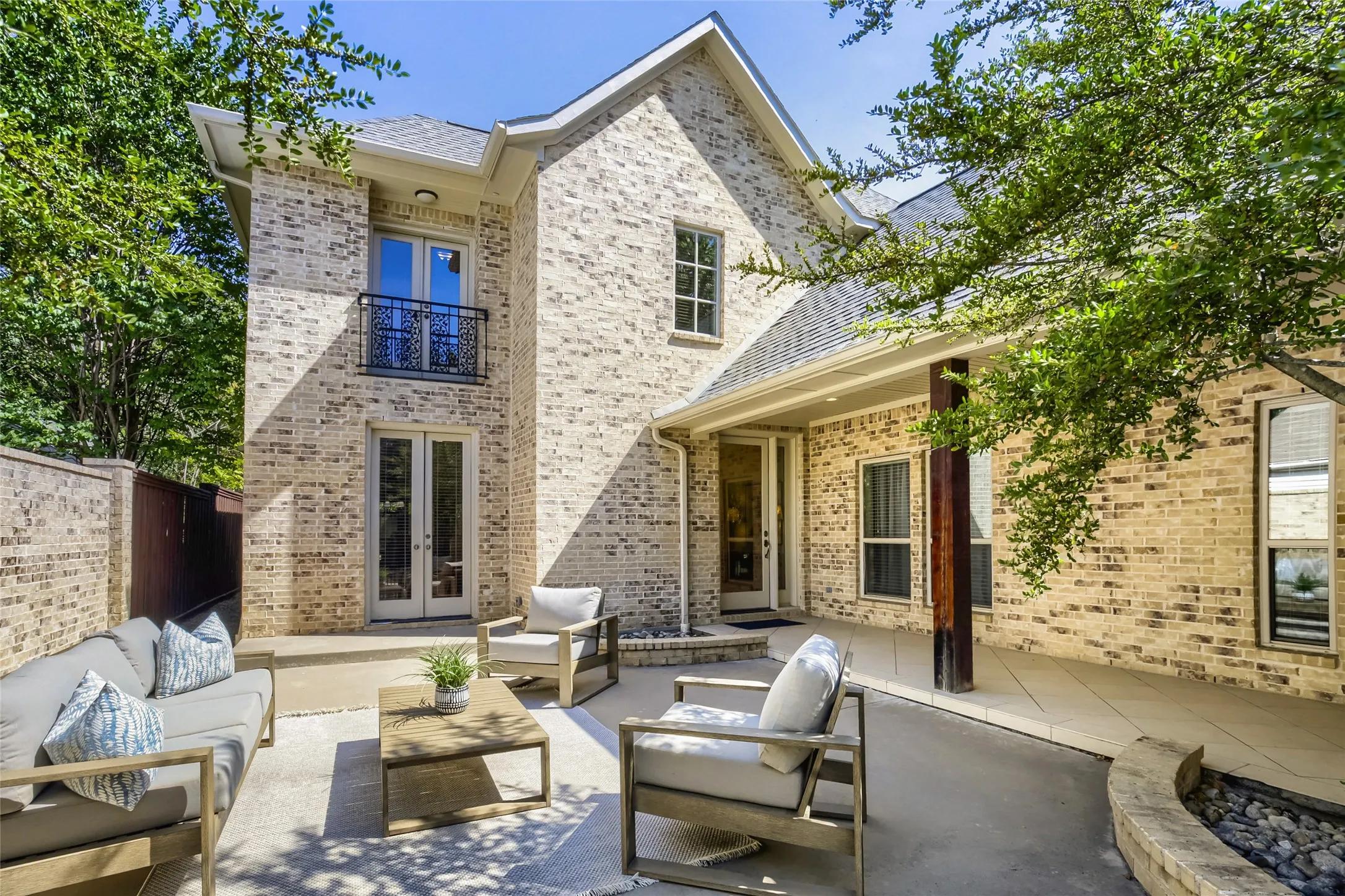 Courtyard has entrance to kitchen and front door.