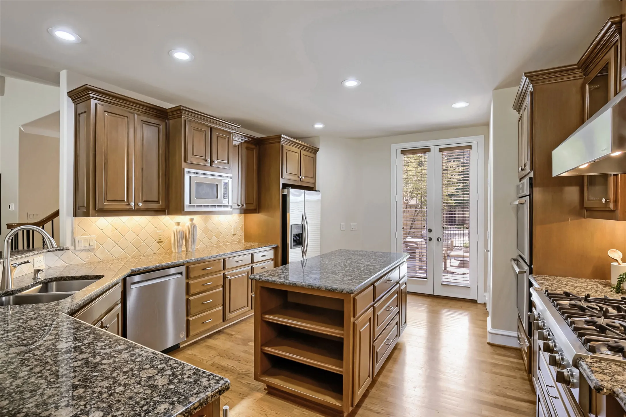Center island and access to front courtyard living area.
