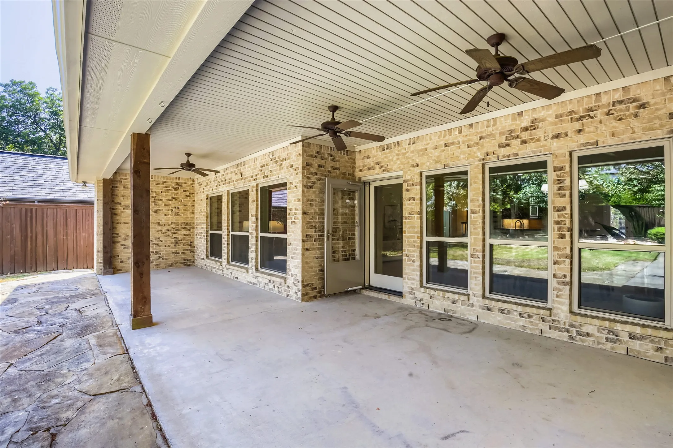 Covered patio spans entire back of the home.