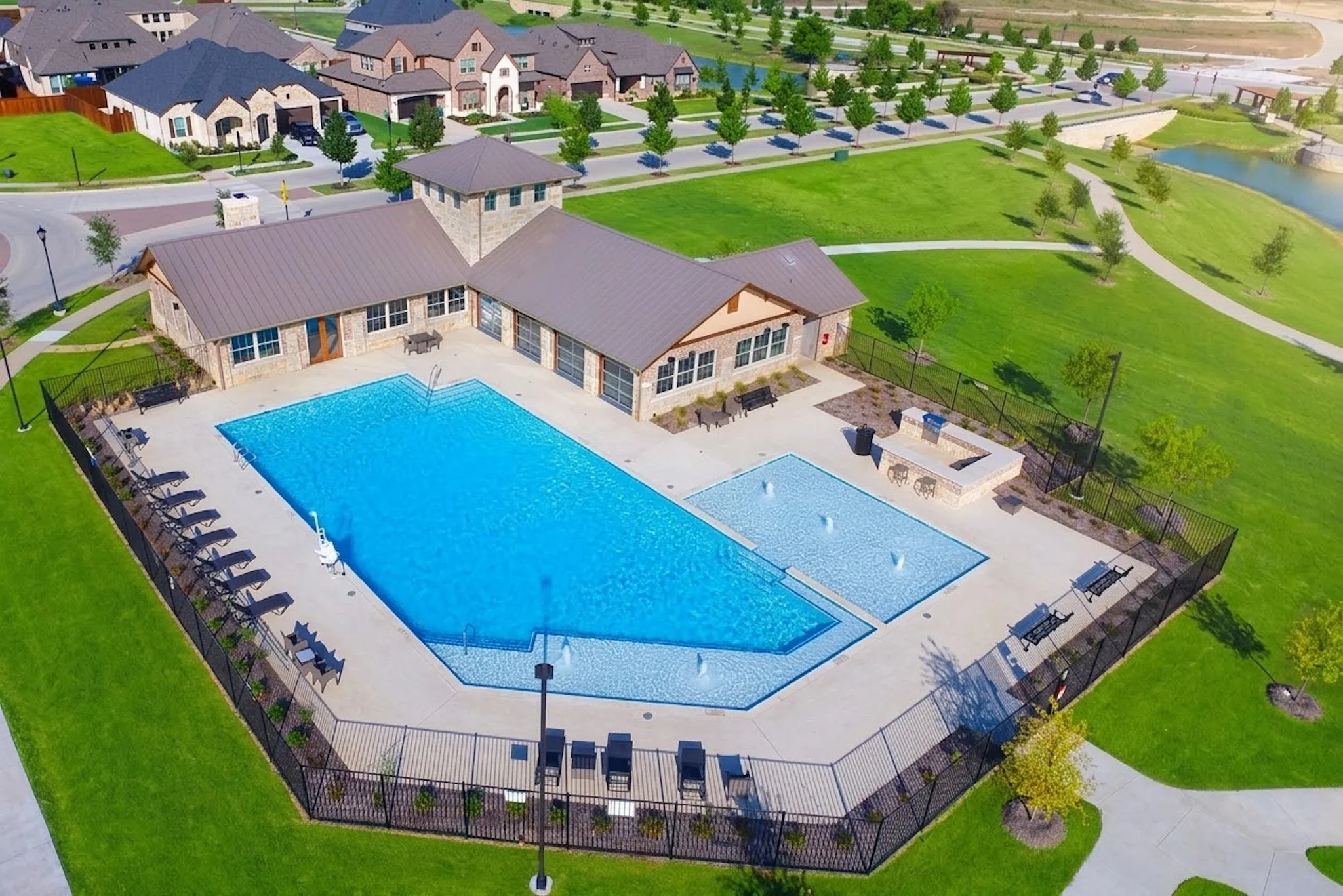 Community resort style pool with water features.