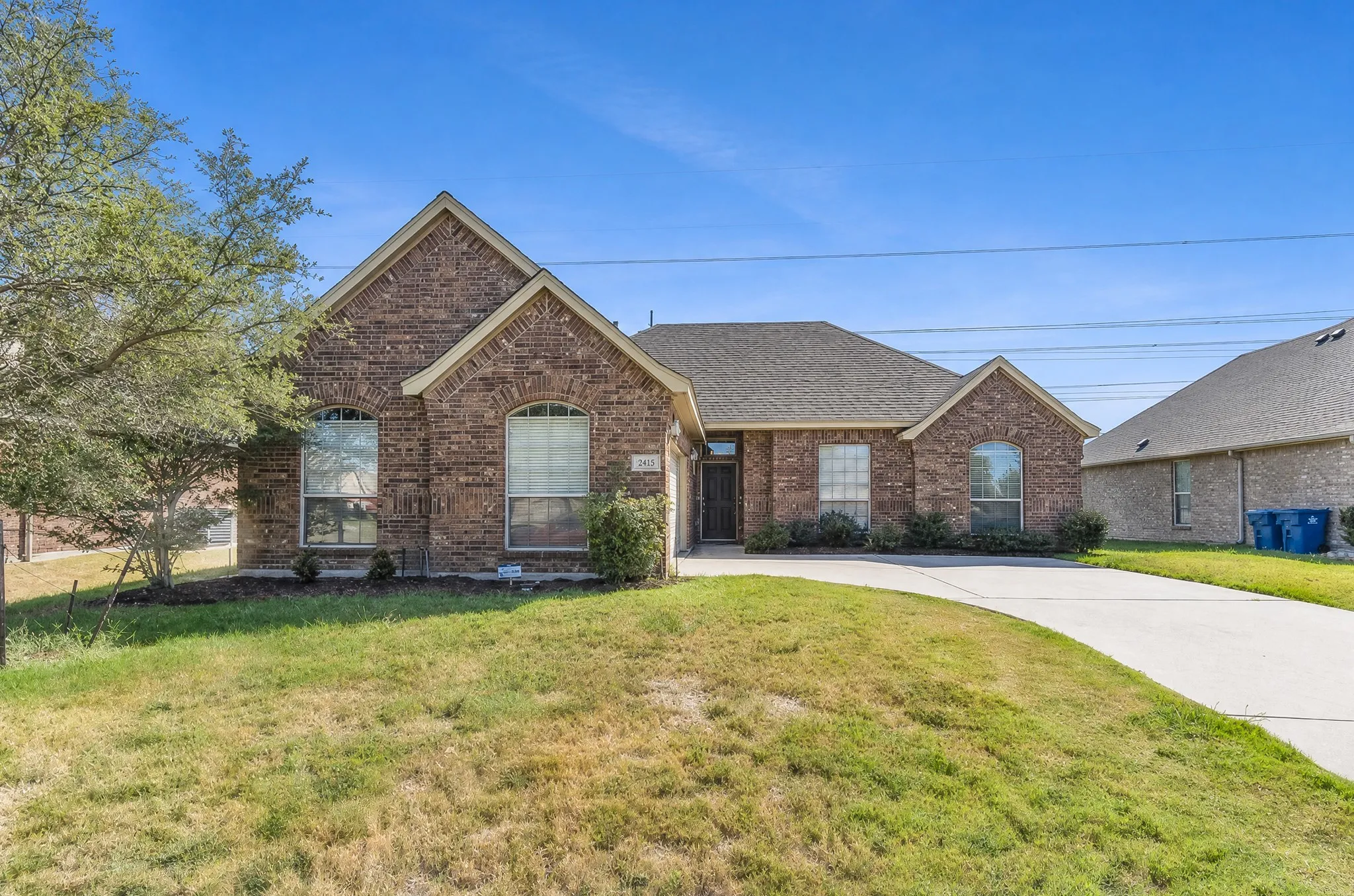 Brick exterior with gabled roof lines