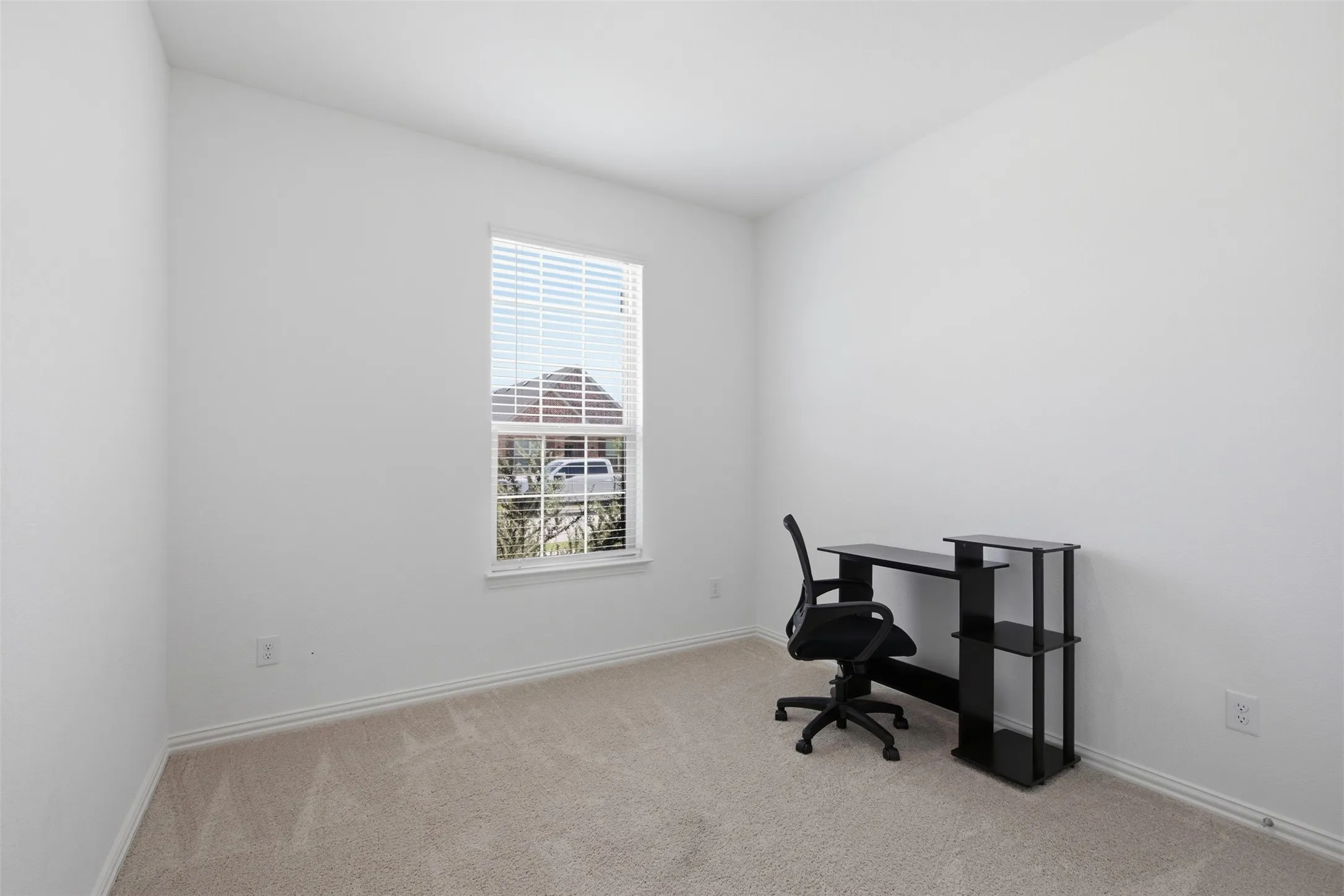 Bedroom currently set up as an office space