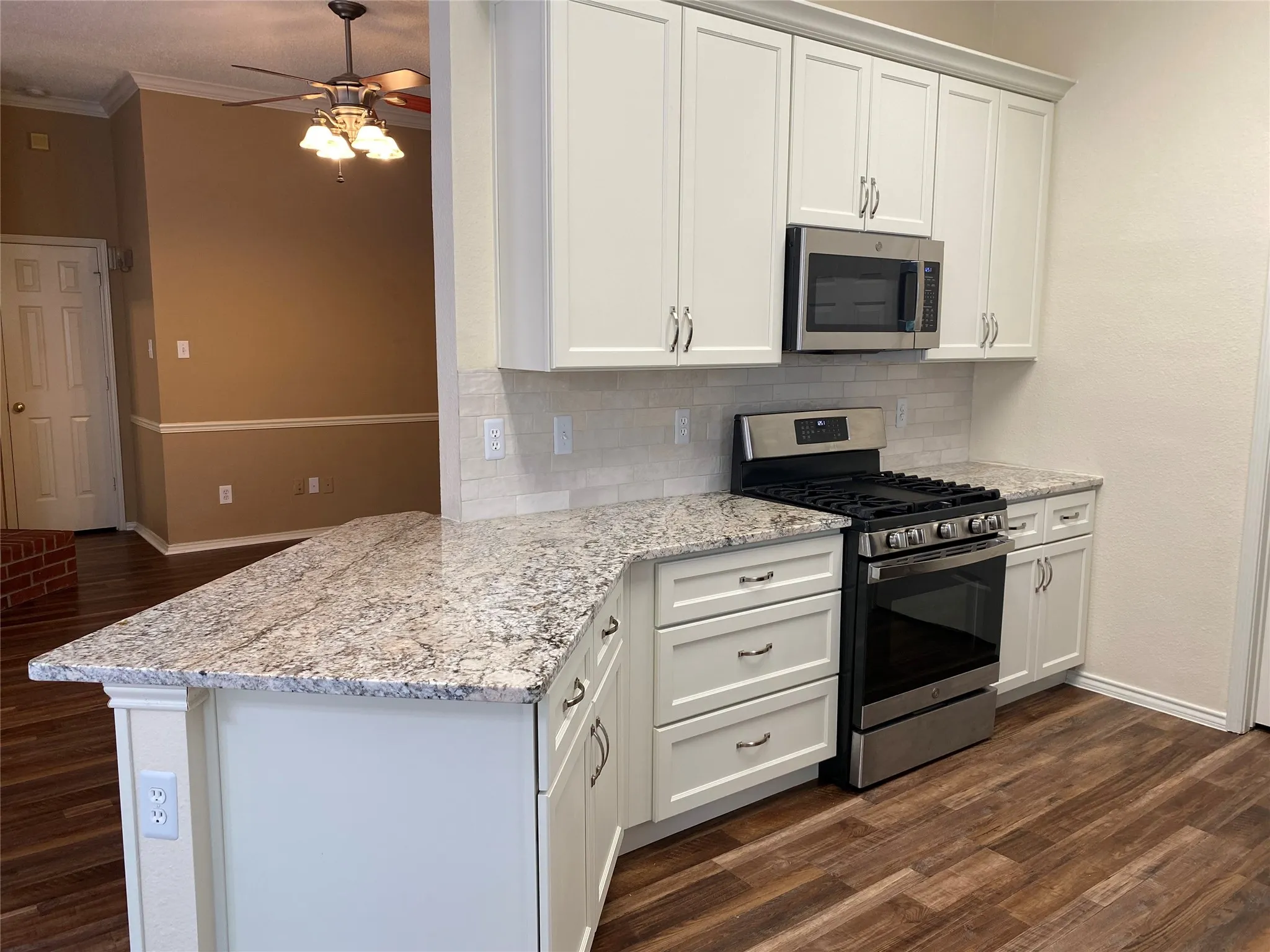 View of Open Kitchen that over looks living from breakfast bar